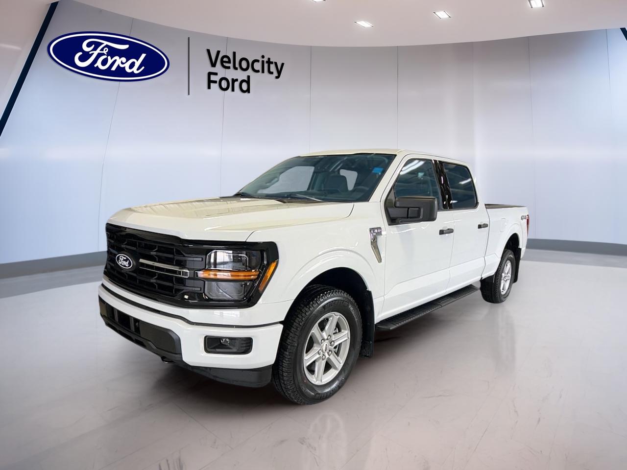 Built for work, family life, and long highway runs, the 2026 Ford F-150 XLT 4WD SuperCrew 6.5 Box delivers the capability Canadians expect from a full-size pickup. This brand new truck at Velocity Ford in Moose Jaw pairs a White exterior with a Dark grey interior, four full doors, automatic transmission, and a 3.5-litre unleaded engine.

FEATURES OF THE F-150 XLT 4WD SuperCrew 6.5 Box
»» SuperCrew cab adds roomy rear seating
»» 6.5-foot box supports longer cargo
»» Four-wheel drive for added traction
»» XLT trim balances value and utility

TRUCK FEATURES
»» Towing capacity rated at 4,626 kg
»» Rear tow hook supports jobsite use
»» Off-road tires aid rough surfaces
»» Spare tire adds backup confidence

ADVANCED SAFETY FEATURES
»» Anti-lock braking system helps controlled stops
»» Stability control supports secure handling
»» Blind spot monitor boosts lane awareness
»» Backup camera helps easier reversing

The 2026 Ford F-150 XLT 4WD SuperCrew 6.5 Box is equipped with practical driver-assist and protection features for daily driving and busy work weeks. Lane departure warning, child safety locks, driver and passenger airbags, side impact airbags, and head side airbags help support peace of mind on every trip.

PERFORMANCE AND EFFICIENCY
»» 3.5-litre unleaded engine delivers strong power
»» Automatic transmission supports smooth shifting
»» Dual shift mode adds manual control
»» Four-wheel drive improves all-season traction

The 2026 Ford F-150 XLT 4WD SuperCrew 6.5 Box is made to handle changing road conditions with confidence. Power steering supports easy manoeuvres in town, while the automatic setup helps keep the drive smooth and simple on highways, gravel roads, and jobsite routes.

COMFORT AND CONVENIENCE
»» Cruise control supports relaxed highway travel
»» Front air conditioning cools cabin quickly
»» Power windows add daily convenience
»» Driver lumbar support aids comfort

Inside, the 2026 Ford F-150 XLT 4WD SuperCrew 6.5 Box offers a practical layout for work and family use. Heated mirrors, electric mirrors, tinted windows, adjustable steering wheel, illuminated vanity mirrors, rear window defroster, and automatic door locks all add useful everyday comfort.

TECHNONOLGY AND CONNECTIVITY
»» Bluetooth integration supports hands-free calling
»» WiFi hotspot keeps devices connected
»» Satellite radio expands listening choices
»» Steering wheel audio controls simplify use

The 2026 Ford F-150 XLT 4WD SuperCrew 6.5 Box gives you the key tools you need to stay connected on the move. Automatic headlights and LED headlamps also improve visibility and convenience, whether you are leaving early for work or heading home after dark.

CARGO SPACE
»» 6.5-foot box handles longer items
»» Rear trunk access improves loading ease
»» Four-door cab supports crew flexibility
»» Large pickup bed suits daily hauling

The 2026 Ford F-150 XLT 4WD SuperCrew 6.5 Box is well suited for tools, gear, supplies, and weekend equipment. Its longer box helps with larger loads, while the roomy cab makes it easier to bring passengers along without giving up the utility expected from a Ford truck.

WHAT OTHER OWNERS LIKE
»» Strong towing for work and trailers
»» Spacious cabin for family travel
»» Easy-to-use technology and controls
»» Confident four-wheel-drive capability

This 2026 Ford F-150 XLT 4WD SuperCrew 6.5 Boxs VIN is: 1FTFW3L86TKD56313 .