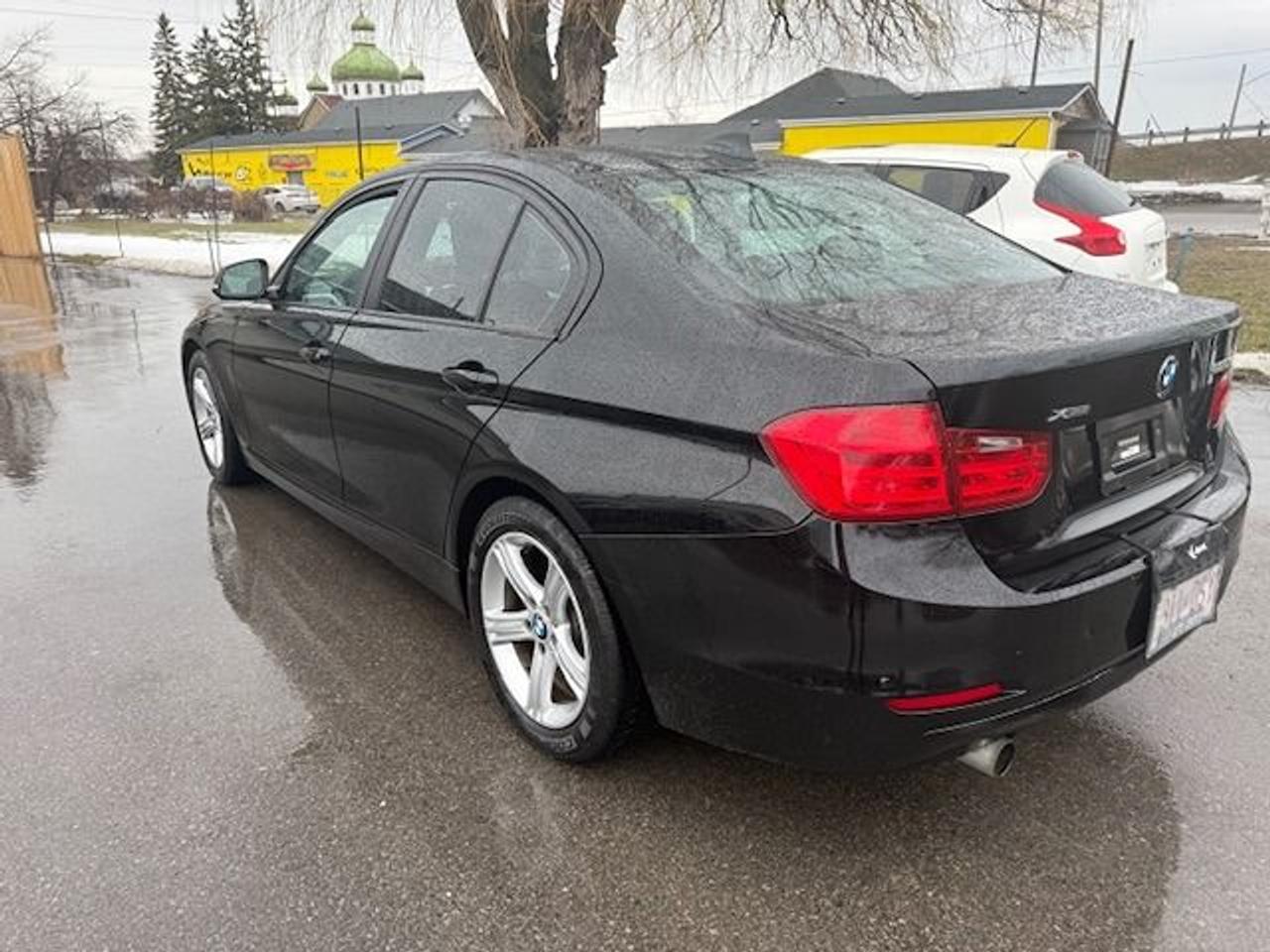 2015 BMW 3 Series 4dr Sdn 320i xDrive AWD Photo