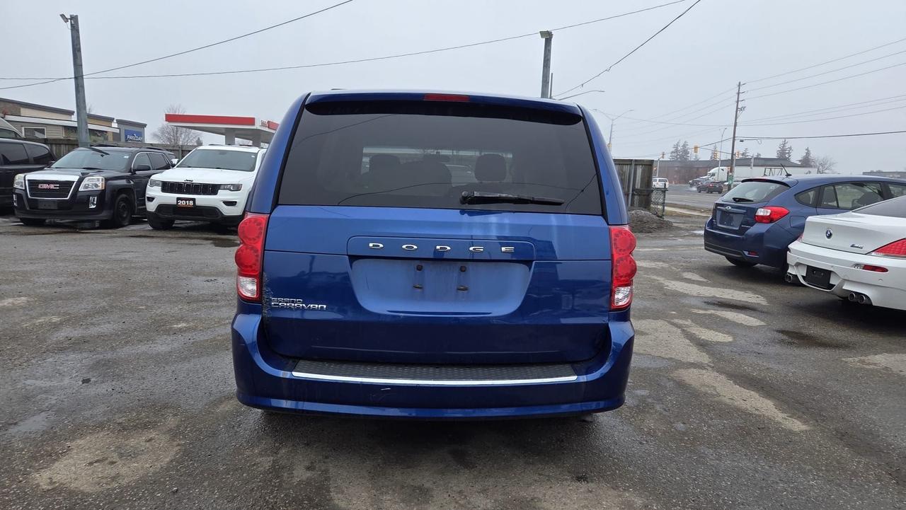 2013 Dodge Grand Caravan SXT, 7 PASSENGER, STOWNGO, AS IS SPECIAL Photo