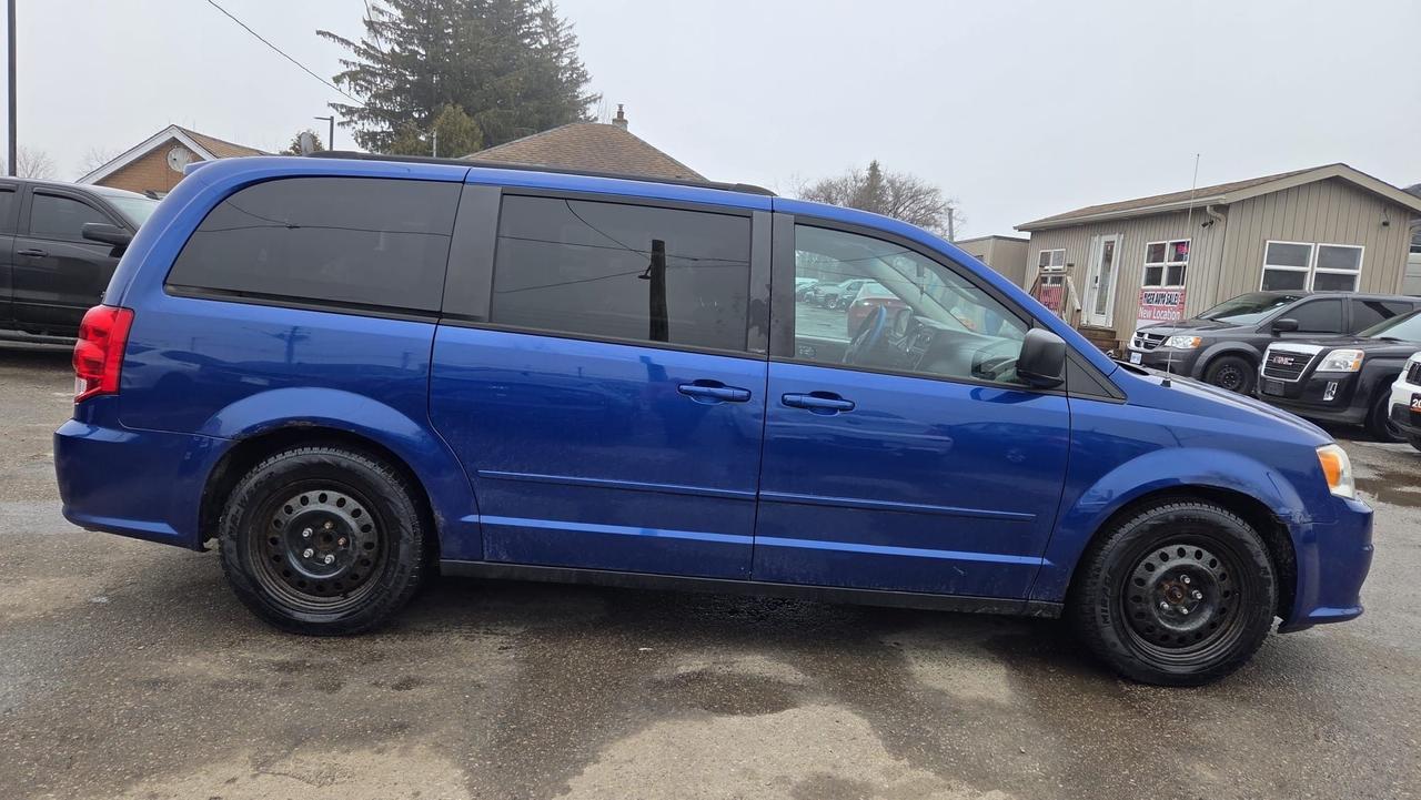 2013 Dodge Grand Caravan SXT, 7 PASSENGER, STOWNGO, AS IS SPECIAL Photo