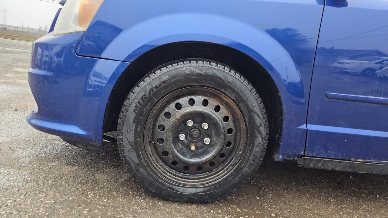 2013 Dodge Grand Caravan SXT, 7 PASSENGER, STOWNGO, AS IS SPECIAL Photo