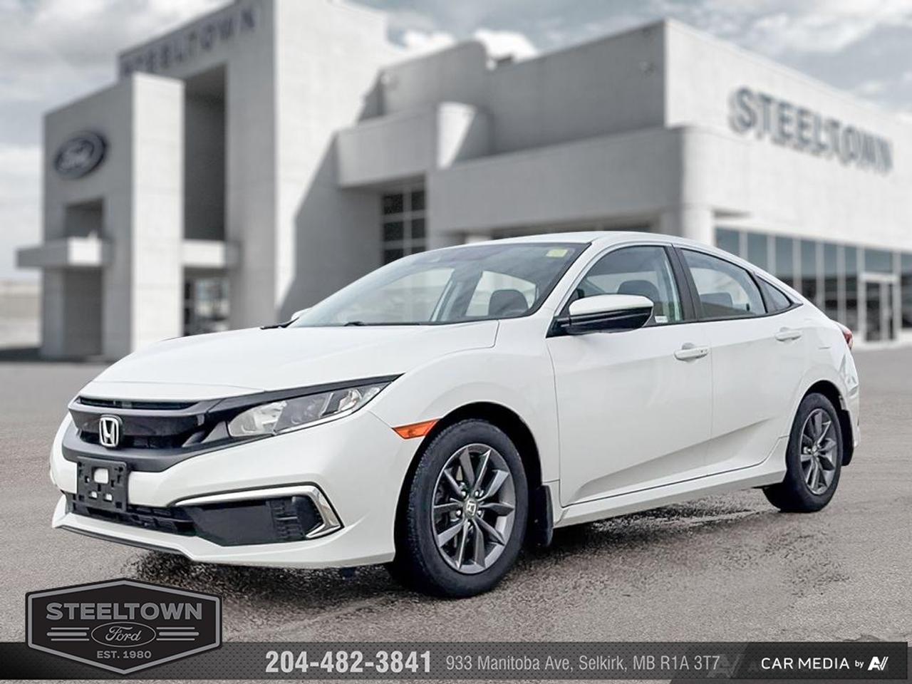 <b>Low Mileage, Sunroof,  Remote Start,  Heated Seats,  Apple CarPlay,  Android Auto!</b><br> <br> We value your TIME, we wont waste it or your gas is on us!   We offer extended test drives and if you cant make it out to us we will come straight to you!<br><br><br> <br>The confident styling and impressive performance of this 2021 Honda Civic solidifies its sports car inspired evolution. This 2021 Honda Civic Sedan is for sale today in Selkirk. <br> <br>With harmonious power, excellent handling capability, plus its engaging driving dynamic, this 2021 Honda Civic is a highly compelling choice in the eco-friendly compact car segment. Regardless of your style preference or driving habits, this impressive Honda Civic will perfectly suit your wants and needs. The Civic offers the right amount of cargo space, an aggressive exterior design with sporty and sleek body lines, plus a comfortable and ergonomic interior layout that works well with all family sizes. This Civic easily makes a bold statement without saying a word! This low mileage sedan has just 44,861 km. Its Modern Steel Metallic in colour. It has an Automatic transmission and is powered by a 158HP 2.0L 4 Cylinder Engine. It may have some remaining factory warranty, please check with dealer for details. <br> <br> Our Civic Sedans trim level is EX. This EX Civic adds a power moonroof, proximity key, aluminum wheels, blind spot display, and remote start to the LX features like collision mitigation with forward collision warning, lane keep assist with road departure mitigation, adaptive cruise control, straight driving assist for slopes, and automatic highbeams you normally only expect with a higher price. The interior is as comfy and advanced as you need with heated front seats, remote start, Apple CarPlay, Android Auto, Bluetooth, Siri EyesFree, WiFi tethering, steering wheel with cruise and audio controls, multi-angle rearview camera, 7 inch driver information display, and automatic climate control. The exterior has some great style with a refreshed grille, independent suspension, heated power side mirrors, and LED taillamps. This vehicle has been upgraded with the following features: Sunroof, Remote Start, Heated Seats, Apple CarPlay, Android Auto, Lane Keep Assist, Collision Mitigation.<br> <br>To apply right now for financing use this link: <a href=http://www.steeltownford.com/?https://CreditOnline.dealertrack.ca/Web/Default.aspx?Token=bf62ebad-31a4-49e3-93be-9b163c26b54c&La target=_blank>http://www.steeltownford.com/?https://CreditOnline.dealertrack.ca/Web/Default.aspx?Token=bf62ebad-31a4-49e3-93be-9b163c26b54c&La</a><br><br> <br/><br> Buy this vehicle now for the lowest bi-weekly payment of <b>$181.51</b> with $0 down for 96 months @ 8.99% APR O.A.C. ( Plus applicable taxes -  Platinum Shield Protection & Tire Warranty included   / Total cost of borrowing $10864   ).  See dealer for details. <br> <br>Family owned and operated in Selkirk for 35 Years.  <br>Steeltown Ford is located just 20 minutes North of the Perimeter Hwy, with an onsite banking center that offers free consultations. <br>Ask about our special dealer rates available through all major banks and credit unions.<br><br><br>Steeltown Ford Protect Plus includes:<br>- Life Time Tire Warranty <br>Cars cost less in Selkirk <br><br>Dealer Permit # 1039<br><br><br> Come by and check out our fleet of 100+ used cars and trucks and 170+ new cars and trucks for sale in Selkirk.  o~o