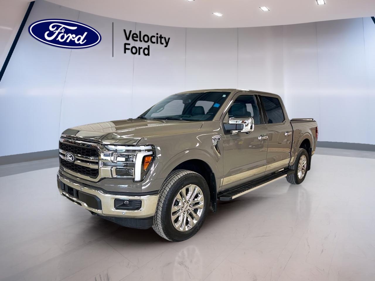 Meet the brand new 2026 Ford F-150 LARIAT 4WD SuperCrew 5.5 Box at Velocity Ford in Moose Jaw. This full-size truck blends strong capability, smart comfort, and modern tech in one confident package. Its Grey exterior and Grey interior give it a clean, upscale look for workdays and weekends alike.

With four doors, an automatic transmission, and a 3.5-litre unleaded engine, the 2026 Ford F-150 LARIAT 4WD SuperCrew 5.5 Box is built for daily ease and real truck duty. It also brings four-wheel drive and a 4,671 kg towing capacity, giving you the strength to haul, tow, and travel with confidence in Canadian conditions.

FEATURES OF THE F-150 LARIAT 4WD SuperCrew 5.5 Box
»» Grey exterior with upscale road presence
»» SuperCrew cab with four full doors
»» Automatic transmission for smooth daily driving
»» 4,671 kg towing capacity for trailers

TRUCK FEATURES
»» Tows up to 4,671 kg confidently
»» Four-wheel drive supports traction on rough roads
»» Rear tow hook adds useful recovery support
»» Side steps help cabin entry

ADVANCED SAFETY FEATURES
»» Backup camera helps with tight parking
»» Blind spot monitor adds lane awareness
»» Lane departure warning supports safer travel
»» Anti-lock brakes with stability control

PERFORMANCE AND EFFICIENCY
»» 3.5-litre unleaded engine delivers strong output
»» Automatic transmission supports smooth power delivery
»» Four-wheel drive boosts all-season traction
»» Off-road tires support tougher terrain use

COMFORT AND CONVENIENCE
»» Heated front seats for cold mornings
»» Dual-zone climate control adds cabin comfort
»» Remote starter warms truck before driving
»» Memory settings add daily driving ease

TECHNONOLGY AND CONNECTIVITY
»» Navigation system helps guide every trip
»» Bluetooth integration supports hands-free calling
»» WiFi hotspot keeps devices connected
»» Satellite radio and HD Radio included

CARGO SPACE
»» 5.5-foot box supports versatile hauling needs
»» Rear trunk access aids loading convenience
»» Spare tire adds peace of mind
»» SuperCrew cabin offers useful interior storage

WHAT OTHER OWNERS LIKE
»» Strong towing power for work and play
»» Comfortable ride for everyday driving
»» User-friendly tech and clear controls
»» Spacious cabin for passengers and gear

This brand new 2026 Ford F-150 LARIAT 4WD SuperCrew 5.5 Box is well equipped for drivers who want proven truck strength without giving up comfort. Cruise control, power steering, power windows, heated and electric mirrors, retractable mirrors, automatic headlights, fog lights, tinted windows, and chrome wheels all add value to every drive.

Inside, this truck is ready for busy days with front air conditioning, automatic climate control, adjustable pedals, an adjustable steering wheel, steering wheel audio controls, ambient lighting, push button start, an auto-dimming rearview mirror, and illuminated vanity mirrors for both front occupants. Power front seats with lumbar support for both driver and passenger help make long drives easier.

Safety remains a key part of the appeal. Driver and passenger airbags, side impact airbags, head side airbags, child safety locks, tire pressure monitoring, automatic door locks, turn signal mirrors, and a rear window defroster all help support peace of mind. This truck is ready to serve as a capable family vehicle, jobsite partner, or travel companion.

At Velocity Ford in Moose Jaw, this new F-150 delivers the blend of toughness, comfort, and everyday usability that has made the F-150 a trusted choice across Canada. It is a smart pick for drivers who need a truck that can tow hard, ride well, and stay connected on every trip.

This 2026 Ford F-150 LARIAT 4WD SuperCrew 5.5 Boxs VIN is: 1FTFW5L84TFA35651.
