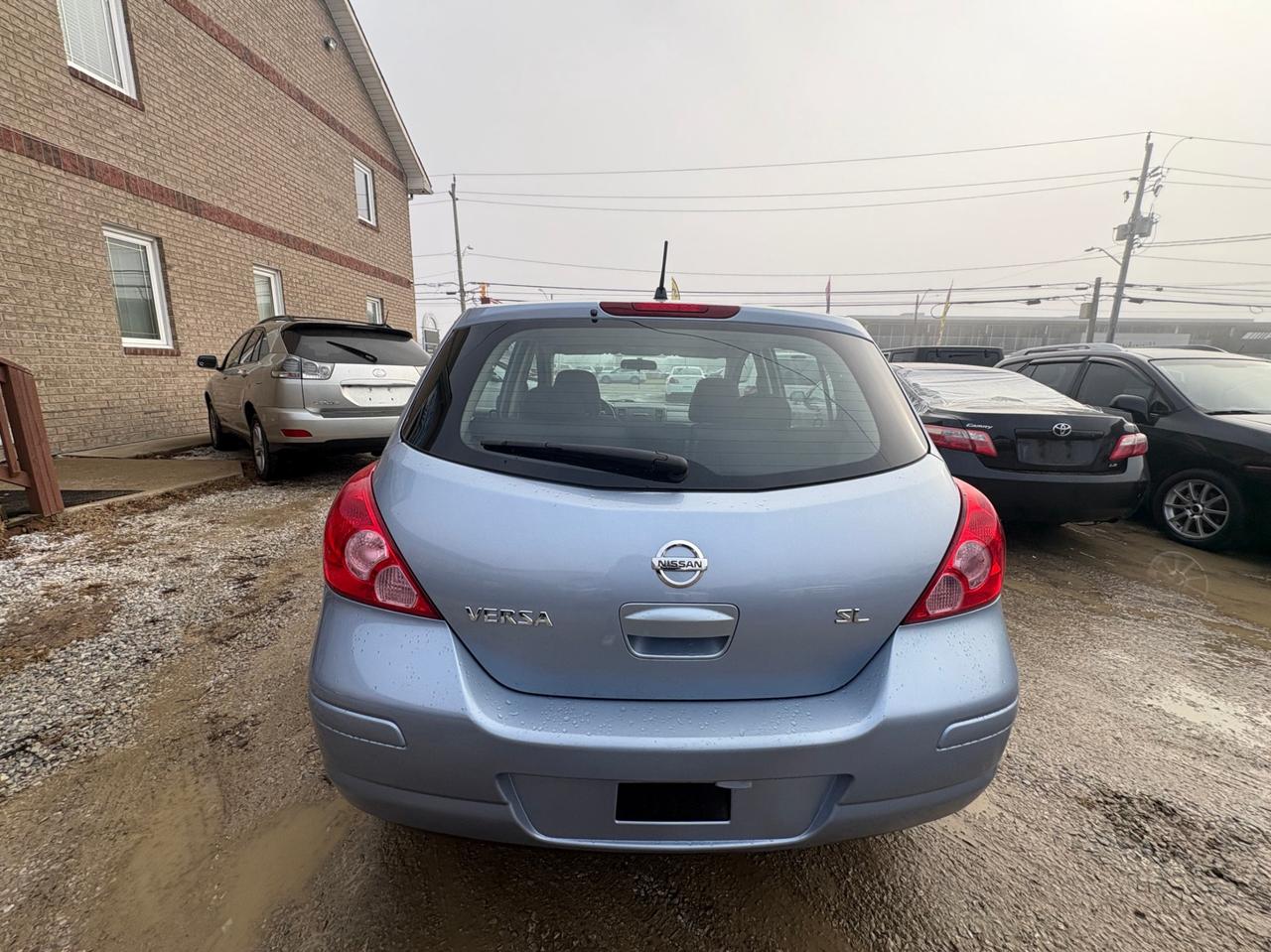 2009 Nissan Versa Hatchback 1.8 SL, ONE OWNER – LOW KM – SAFETY + WARRANTY Photo