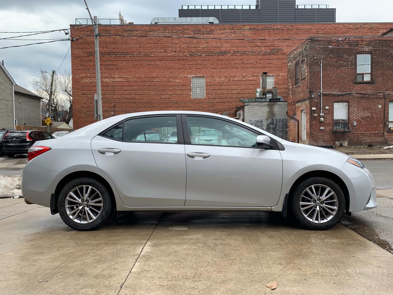 2015 Toyota Corolla 4dr Sdn CVT LE Photo