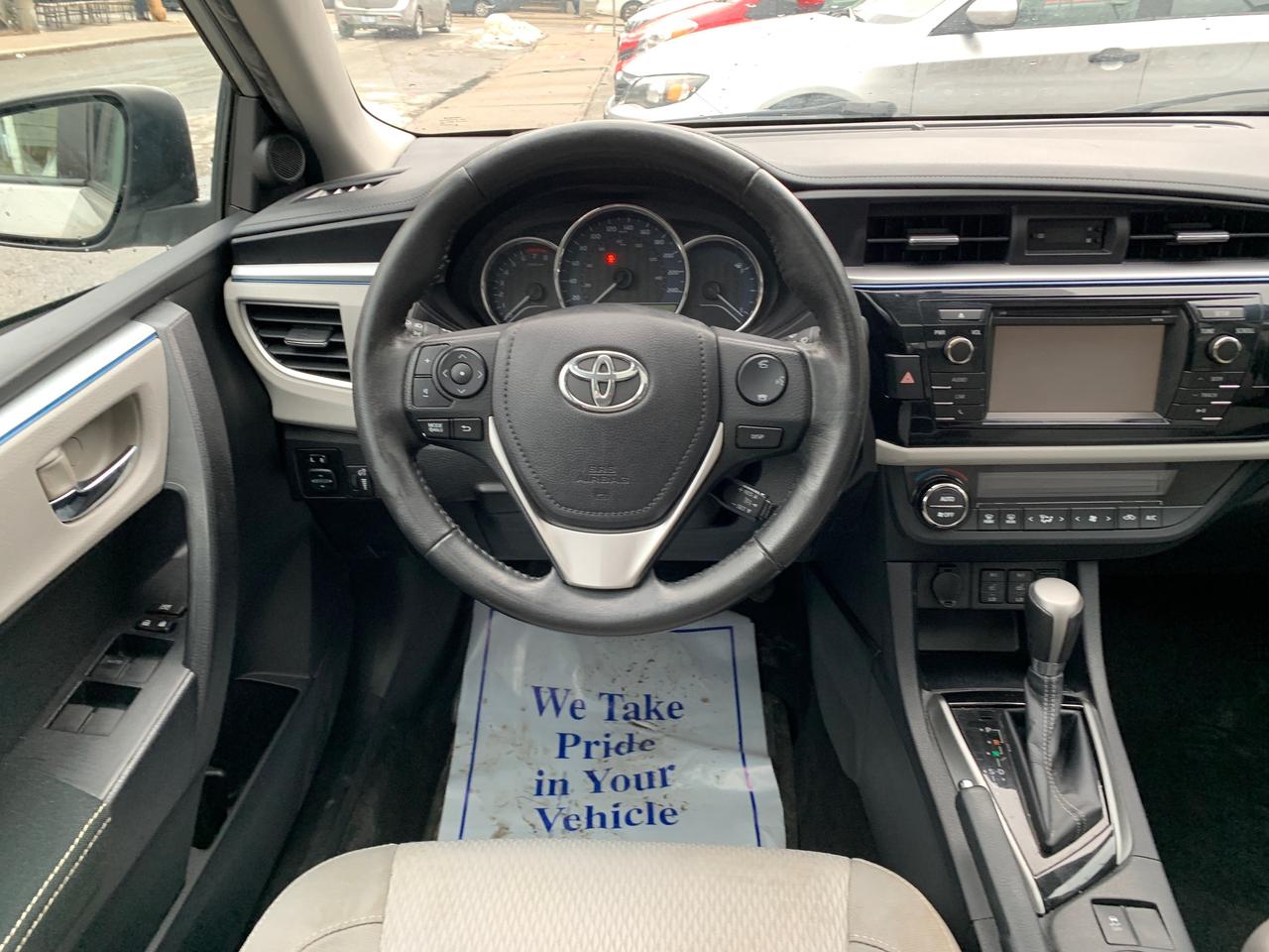 2015 Toyota Corolla 4dr Sdn CVT LE Photo