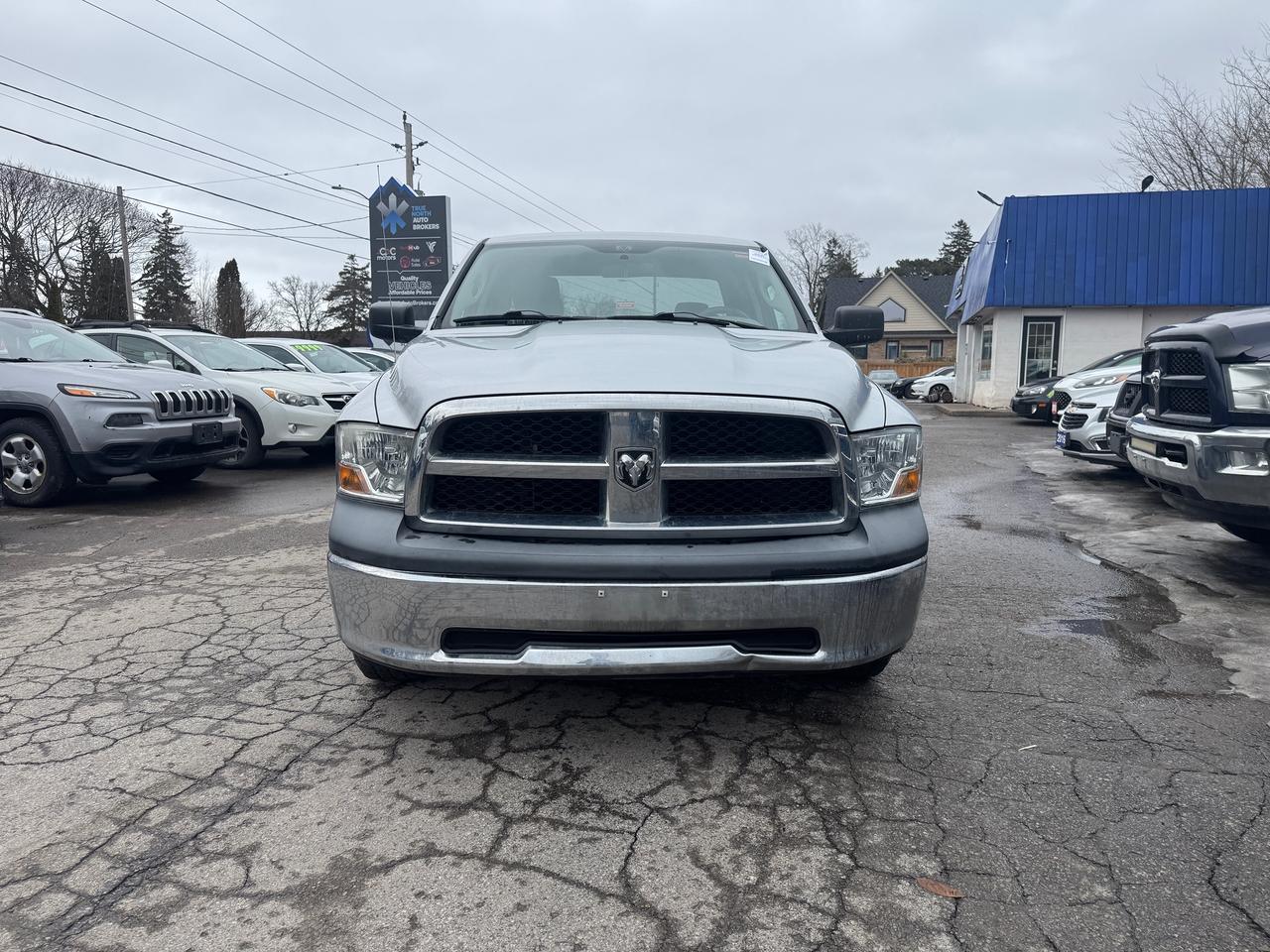 2010 Dodge Ram 1500 4WD Quad Cab 140.5" ST - Photo #2