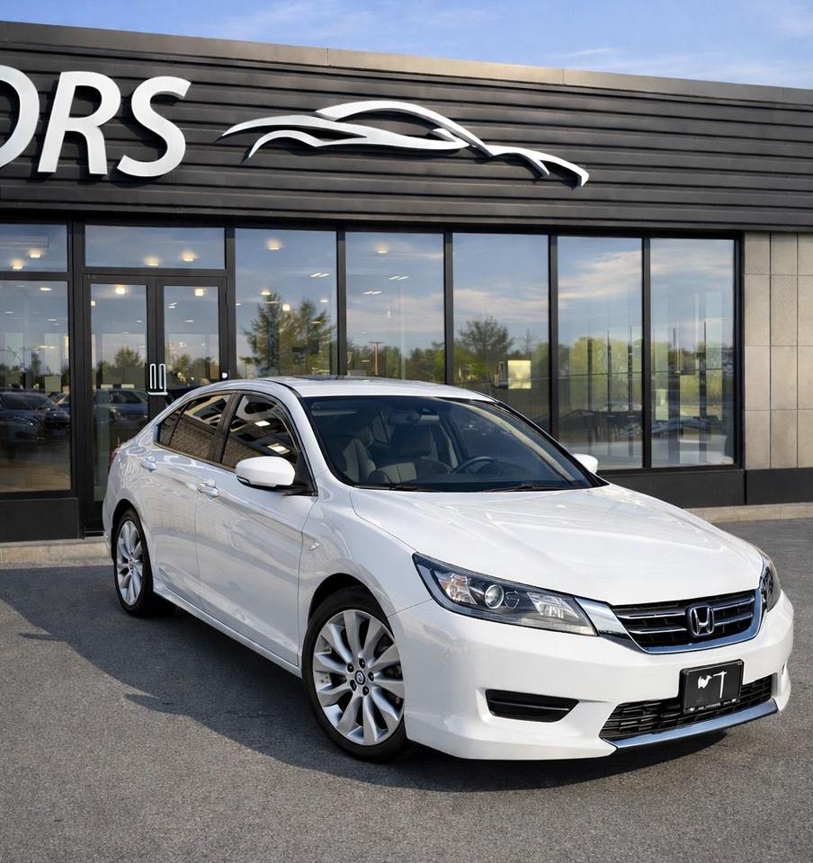<div>&nbsp;</div><div>&nbsp;</div><p>Looking for a reliable and fuel-efficient sedan? Check out this pristine white 2014 Honda Accord LX, available now at JSP Motors! This well-maintained Accord is the perfect blend of practicality and comfort, making it an ideal choice for daily commutes or weekend getaways. With a sleek design and timeless appeal, this four-door sedan is ready to impress. This Accord has been driven 220,788km.</p><p>Inside, youll find a comfortable black interior, designed to make every journey enjoyable. The responsive 4-cylinder engine and smooth Variable Transmission (CVT) provide a pleasant driving experience while maximizing fuel economy. This Accord is ready to hit the road and offer you years of dependable service.</p><p>Here are five features that make this 2014 Honda Accord LX stand out:</p><ul><li><strong>Fuel-sipping Efficiency:</strong> The efficient 4-cylinder engine ensures you spend less time at the pump and more time enjoying the drive.</li><li><strong>Smooth Ride:</strong> The Variable Transmission (CVT) provides seamless gear changes for a comfortable and effortless driving experience.</li><li><strong>Spacious Interior:</strong> Enjoy ample legroom and headroom for both passengers and cargo.</li><li><strong>Reliable Honda Engineering:</strong> Known for their dependability and longevity, Honda vehicles are built to last.</li><li><strong>Stylish Design:</strong> The classic white exterior and sleek sedan body style offer a timeless and sophisticated look.</li></ul><p><strong><em>Powered by AutoIntelligence&trade;</em></strong> Vehicle information has been generated using artificial intelligence and is provided for informational purposes only. While efforts are made to ensure accuracy, please confirm all details directly with the dealer.</p>