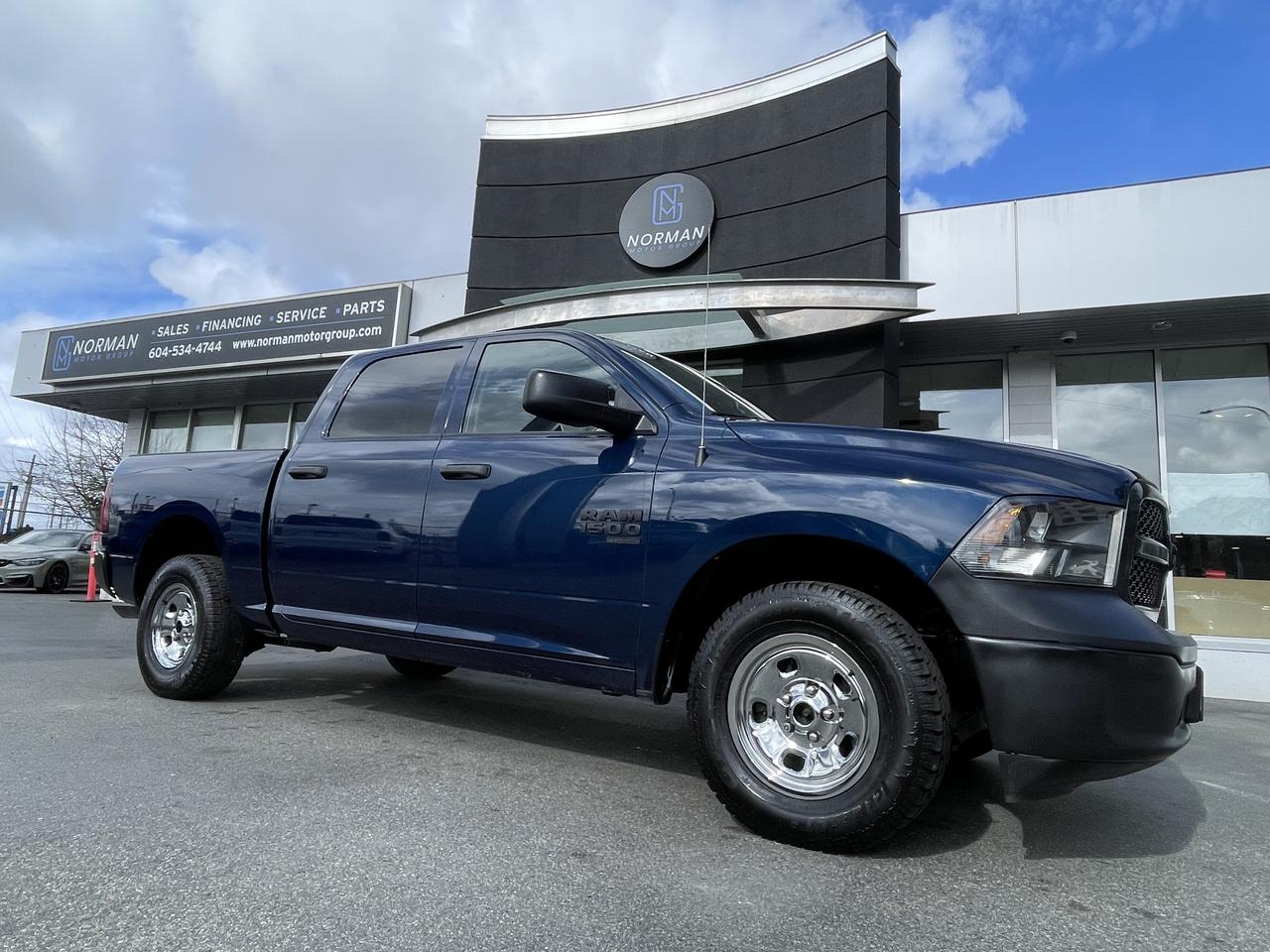 <p>RAM 1500 TRADESMAN CREW CAB 4X4&nbsp;<br>Exterior Color: Patriot Blue Pearl&nbsp;<br>Interior Color: Black interior / Diesel Grey seats Interior: Cloth front 40/20/40 split bench seat Engine: 3.6L Pentastar VVT V6 engine Transmission: 8&ndash;speed automatic transmission&nbsp;<br>STANDARD EQUIPMENT (UNLESS REPLACED BY OPTIONAL EQUIPMENT)<br>Advanced multistage front air bags<br>Supplemental side curtain air bags<br>Supplemental side air bags<br>Supplemental front seat&ndash;mounted side air bags<br>ParkView Rear Back&ndash;Up Camera<br>4&ndash;wheel anti&ndash;lock disc brakes<br>Electronic Stability Control<br>Tire pressure monitoring system<br>Automatic headlamps<br>4&ndash;pin wiring harness<br>Engine block heater<br>730&ndash;amp maintenance&ndash;free battery<br>12&ndash;volt auxiliary power outlet<br>Air conditioning<br>Cruise control<br>Power windows with front 1&ndash;touch up and down<br>Hands&ndash;free phone communication<br>OPTIONAL EQUIPMENT (May Replace Standard Equipment)<br>Patriot Blue Pearl $395<br>Customer Preferred Package 29B&nbsp;<br>Tradesman Package&nbsp;<br>Tradesman Black Package $725<br>Black exterior badging&nbsp;<br>Black Rams head tailgate badge&nbsp;<br>Black grille with Black Rams head&nbsp;<br>Black 4x4 badge&nbsp;<br>17x7&ndash;inch Semi&ndash;Gloss Black aluminum wheels&nbsp;<br>Popular Equipment Group $520<br>Cloth front 40/20/40 split bench seat&nbsp;<br>Second&ndash;row in&ndash;floor storage bins&nbsp;<br>Carpet floor covering&nbsp;<br>Front floor mats&nbsp;<br>Rear floor mats&nbsp;<br>Remote keyless entry&nbsp;<br>SiriusXM satellite radio with 1&ndash;year subscription&nbsp;<br>1&ndash;year SiriusXM satellite radio subscription&nbsp;<br>3.55 rear axle ratio $195<br>Anti&ndash;spin differential rear axle $595<br>Class IV hitch receiver $495<br>Federal A/C Excise Tax $100<br>Destination Charge $2,095</p>