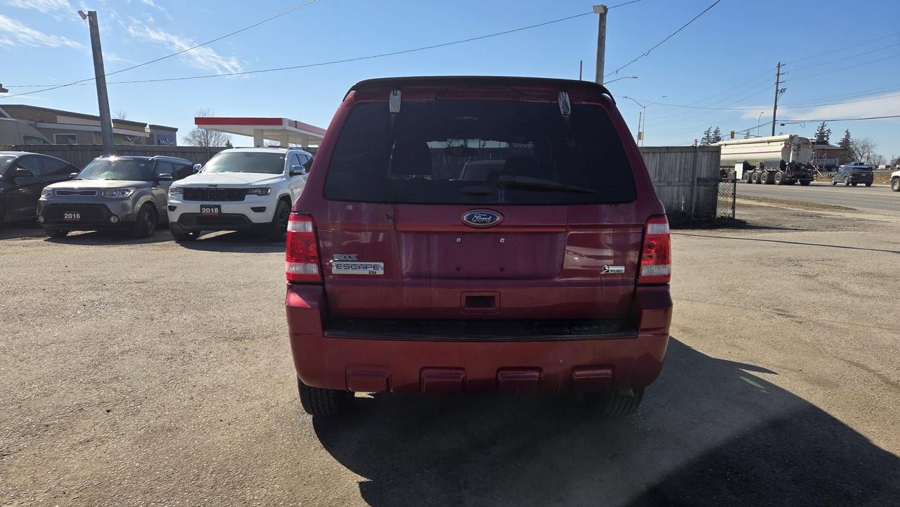 2011 Ford Escape XLT, V6, HAS RUST, DRIVES WELL, 185KMS, AS IS Photo