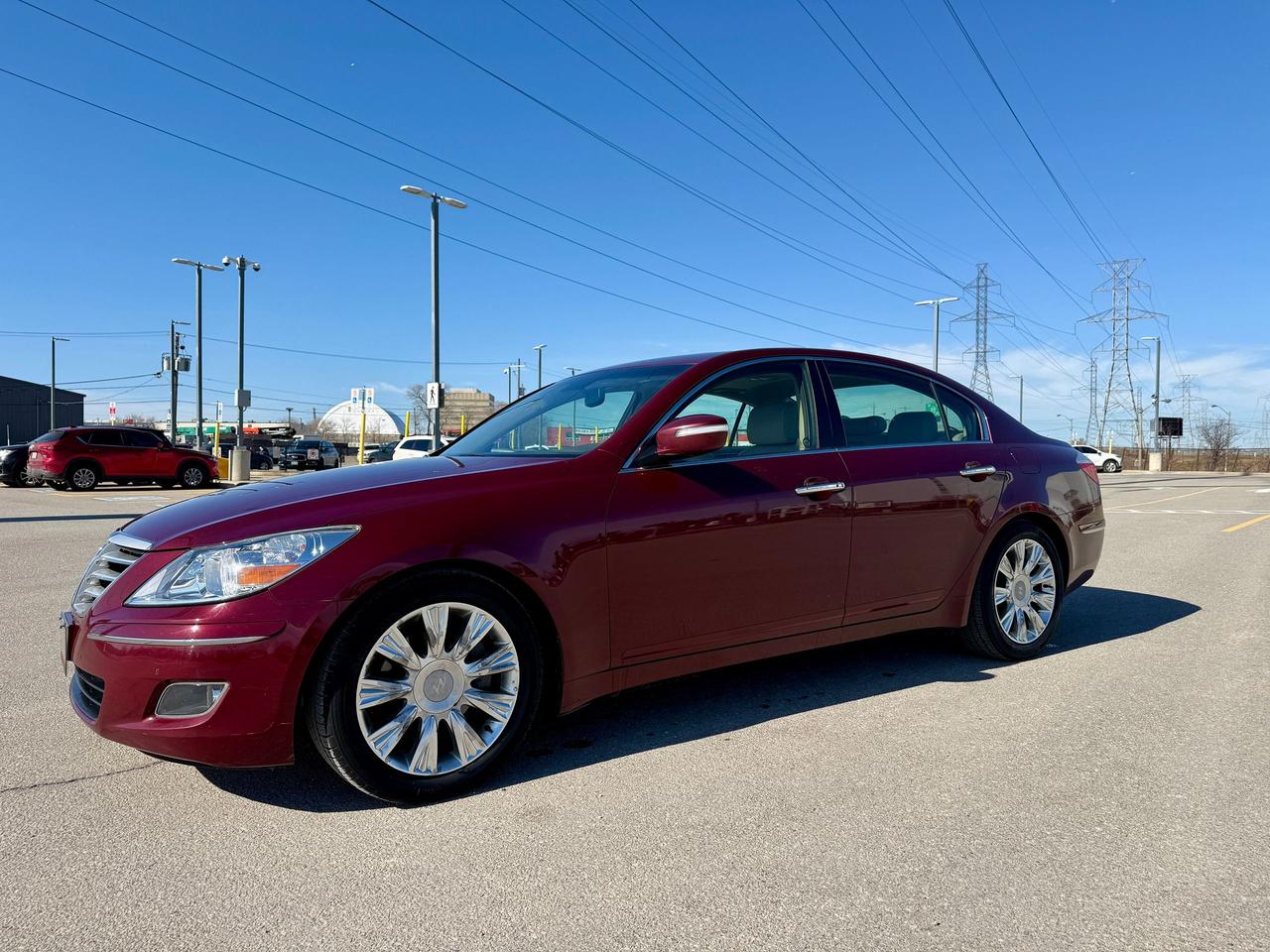 <p>Looking for a touch of luxury and performance without the new-car price tag? Then check out this stunning 2009 Hyundai Genesis with the Premium Package, now available at Select Auto Centre Ltd.! This elegant burgundy sedan with a refined beige interior offers a driving experience that&rsquo;s sure to impress. With only 107,400km on the odometer, this Genesis has been meticulously maintained and is ready to provide you with years of comfortable and confident driving. Its classic lines and sophisticated design are sure to turn heads wherever you go.</p><p>This Genesis isnt just about looks, its packed with features designed to elevate your driving experience. The Premium Package means you&rsquo;ll enjoy a wealth of amenities that enhance comfort, convenience, and safety. Its rear-wheel-drive configuration provides a sporty feel, offering a more engaging driving experience. This Genesis is a testament to Hyundais commitment to quality and value, making it an excellent choice for anyone seeking a premium driving experience without breaking the bank.</p><p>Heres a peek at some of the highlights:</p><ul><li><strong>Premium Comfort:</strong> Sink into the luxurious interior and experience the difference.</li><li><strong>Certified Confidence:</strong> Rest assured knowing this vehicle has been thoroughly inspected.</li><li><strong>Sporty Performance:</strong> Enjoy the engaging feel of rear-wheel drive.</li><li><strong>Automatic Transmission:</strong> Smooth, effortless gear changes.</li><li><strong>Elegant Styling:</strong> Make a statement with its sophisticated design.</li></ul><p>$7488 + HST & LIC. CERTIFIED.</p><p><strong><em>Powered by AutoIntelligence&trade;</em></strong> Vehicle information has been generated using artificial intelligence and is provided for informational purposes only. While efforts are made to ensure accuracy, please confirm all details directly with the dealer.</p>