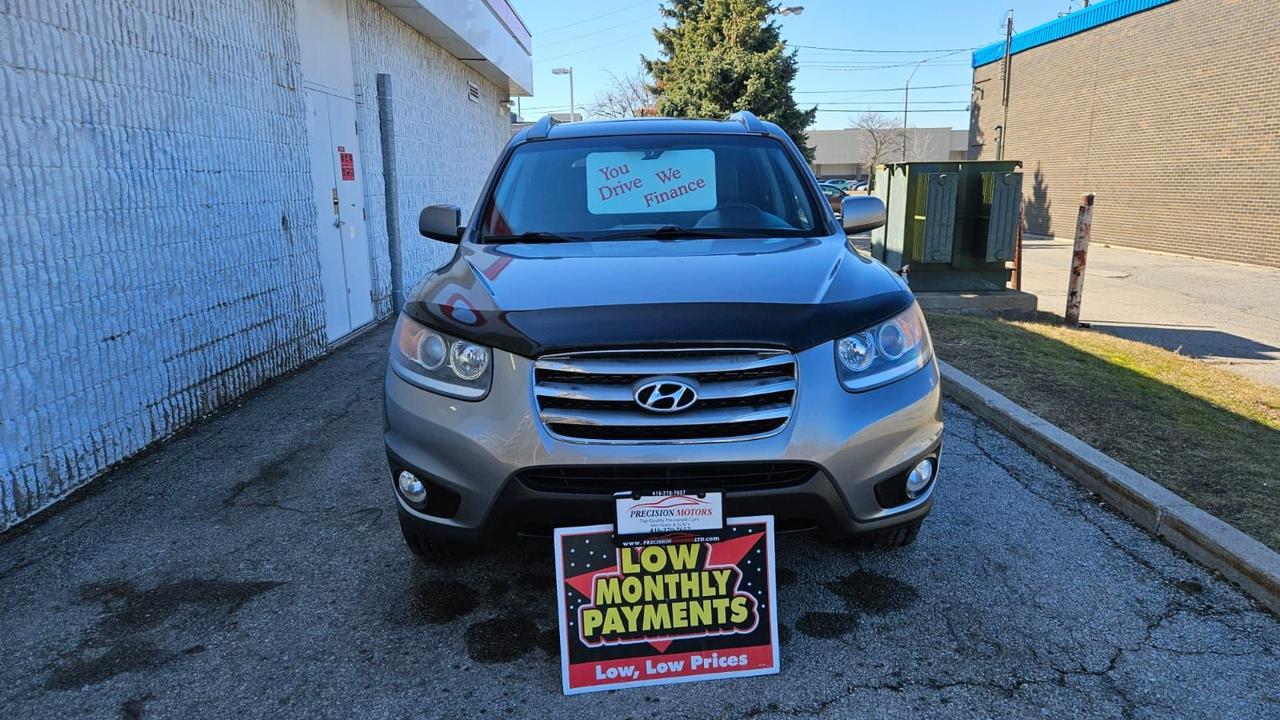 <p class=MsoNormal><span lang=EN-CA style=font-family: Segoe UI Emoji,sans-serif; mso-bidi-font-family: Segoe UI Emoji;>🚙</span><span lang=EN-CA> <strong>2012 HYUNDAI SANTA FE 4dr V6 Auto GL Sport &ndash; | CERTIFIED&nbsp; | IN-HOUSE FINANCING AVAILABLE</strong> </span><span lang=EN-CA style=font-family: Segoe UI Emoji,sans-serif; mso-bidi-font-family: Segoe UI Emoji;>✅</span><span lang=EN-CA><br style=mso-special-character: line-break;><!-- [if !supportLineBreakNewLine]--><!--[endif]--></span></p><p class=MsoNormal><span lang=EN-CA style=font-family: Segoe UI Emoji,sans-serif; mso-bidi-font-family: Segoe UI Emoji;>💰</span><span lang=EN-CA> <strong>Price:</strong> $10,995 + HST & Licensing<br></span><span lang=EN-CA style=font-family: Segoe UI Emoji,sans-serif; mso-bidi-font-family: Segoe UI Emoji;>📍</span><span lang=EN-CA> <strong>Dealer:</strong> Precision Motors &ndash; 643 Parkdale Ave N, Hamilton, ON<br></span><span lang=EN-CA style=font-family: Segoe UI Emoji,sans-serif; mso-bidi-font-family: Segoe UI Emoji;>📞</span><span lang=EN-CA> <strong>Call/Text:</strong> 416-270-7657</span></p><p class=MsoNormal><span lang=EN-CA style=font-family: Segoe UI Emoji,sans-serif; mso-bidi-font-family: Segoe UI Emoji;>📝</span><span lang=EN-CA> <strong>Safety Certified | Accident-Free | Fully Inspected | Ready to Drive</strong></span></p><div class=MsoNormal style=text-align: center; align=center><hr align=center size=2 width=100%></div><p class=MsoNormal><strong><span lang=EN-CA style=font-family: Segoe UI Emoji,sans-serif; mso-bidi-font-family: Segoe UI Emoji;>🔍</span><span lang=EN-CA> Vehicle Details</span></strong></p><p class=MsoNormal><span lang=EN-CA style=font-family: Segoe UI Emoji,sans-serif; mso-bidi-font-family: Segoe UI Emoji;>✅</span><span lang=EN-CA> <strong>VIN:</strong> 5XYZGDAG3CG148373</span></p><p class=MsoNormal><span lang=EN-CA style=font-family: Segoe UI Emoji,sans-serif; mso-bidi-font-family: Segoe UI Emoji;>✅</span><span lang=EN-CA> <strong>Year:</strong> 2012<br></span><span lang=EN-CA style=font-family: Segoe UI Emoji,sans-serif; mso-bidi-font-family: Segoe UI Emoji;>✅</span><span lang=EN-CA> <strong>Make / Model:</strong> Hyundai Santa Fe!!<br></span><span lang=EN-CA style=font-family: Segoe UI Emoji,sans-serif; mso-bidi-font-family: Segoe UI Emoji;>✅</span><span lang=EN-CA> <strong>Trim:</strong> AWD 4dr V6 Auto GL Sport<br></span><span lang=EN-CA style=font-family: Segoe UI Emoji,sans-serif; mso-bidi-font-family: Segoe UI Emoji;>✅</span><span lang=EN-CA> <strong>Mileage:</strong> ONLY 170,077 KM<br></span><span lang=EN-CA style=font-family: Segoe UI Emoji,sans-serif; mso-bidi-font-family: Segoe UI Emoji;>✅</span><span lang=EN-CA> <strong>Transmission:</strong> Automatic<br></span><span lang=EN-CA style=font-family: Segoe UI Emoji,sans-serif; mso-bidi-font-family: Segoe UI Emoji;>✅</span><span lang=EN-CA> <strong>Fuel Type:</strong> Gasoline<br></span><span lang=EN-CA style=font-family: Segoe UI Emoji,sans-serif; mso-bidi-font-family: Segoe UI Emoji;>✅</span><span lang=EN-CA> <strong>Drivetrain:</strong> AWD<br></span><span lang=EN-CA style=font-family: Segoe UI Emoji,sans-serif; mso-bidi-font-family: Segoe UI Emoji;>✅</span><span lang=EN-CA> <strong>Exterior Colour:</strong> <em>Insert</em><br></span><span lang=EN-CA style=font-family: Segoe UI Emoji,sans-serif; mso-bidi-font-family: Segoe UI Emoji;>✅</span><span lang=EN-CA> <strong>Interior Colour:</strong> <em>Insert</em><br></span><span lang=EN-CA style=font-family: Segoe UI Emoji,sans-serif; mso-bidi-font-family: Segoe UI Emoji;>✅</span><span lang=EN-CA> <strong>Doors:</strong> 4<br></span><span lang=EN-CA style=font-family: Segoe UI Emoji,sans-serif; mso-bidi-font-family: Segoe UI Emoji;>✅</span><span lang=EN-CA> <strong>Seating:</strong> 5 Passengers</span></p><div class=MsoNormal style=text-align: center; align=center><hr align=center size=2 width=100%></div><p class=MsoNormal><strong><span lang=EN-CA style=font-family: Segoe UI Emoji,sans-serif; mso-bidi-font-family: Segoe UI Emoji;>🌟</span><span lang=EN-CA> Features & Options</span></strong></p><p class=MsoNormal><strong><span lang=EN-CA style=font-family: Segoe UI Emoji,sans-serif; mso-bidi-font-family: Segoe UI Emoji;>🚘</span><span lang=EN-CA> Comfort & Convenience</span></strong></p><p class=MsoNormal><span lang=EN-CA style=font-family: Segoe UI Emoji,sans-serif; mso-bidi-font-family: Segoe UI Emoji;>✅</span><span lang=EN-CA> Leathe Heated Seats</span></p><p class=MsoNormal><span lang=EN-CA><span lang=EN-CA style=font-family: Segoe UI Emoji,sans-serif; mso-bidi-font-family: Segoe UI Emoji;>✅ Sunroof</span></span></p><p class=MsoNormal><span lang=EN-CA style=font-family: Segoe UI Emoji,sans-serif; mso-bidi-font-family: Segoe UI Emoji;>✅</span><span lang=EN-CA> Power Adjustable Driver Seat<br></span><span lang=EN-CA style=font-family: Segoe UI Emoji,sans-serif; mso-bidi-font-family: Segoe UI Emoji;>✅</span><span lang=EN-CA> Remote Keyless Entry<br></span><span lang=EN-CA style=font-family: Segoe UI Emoji,sans-serif; mso-bidi-font-family: Segoe UI Emoji;>✅</span><span lang=EN-CA> Cruise Control<br></span><span lang=EN-CA style=font-family: Segoe UI Emoji,sans-serif; mso-bidi-font-family: Segoe UI Emoji;>✅</span><span lang=EN-CA> Air Conditioning<br></span><span lang=EN-CA style=font-family: Segoe UI Emoji,sans-serif; mso-bidi-font-family: Segoe UI Emoji;>✅</span><span lang=EN-CA> Tilt & Telescopic Steering Wheel</span></p><p class=MsoNormal><strong><span lang=EN-CA style=font-family: Segoe UI Emoji,sans-serif; mso-bidi-font-family: Segoe UI Emoji;>🎵</span><span lang=EN-CA> Entertainment & Connectivity</span></strong></p><p class=MsoNormal><span lang=EN-CA style=font-family: Segoe UI Emoji,sans-serif; mso-bidi-font-family: Segoe UI Emoji;>✅</span><span lang=EN-CA> Bluetooth Hands-Free Calling<br></span><span lang=EN-CA style=font-family: Segoe UI Emoji,sans-serif; mso-bidi-font-family: Segoe UI Emoji;>✅</span><span lang=EN-CA> AM / FM / CD / MP3 Stereo<br></span><span lang=EN-CA style=font-family: Segoe UI Emoji,sans-serif; mso-bidi-font-family: Segoe UI Emoji;>✅</span><span lang=EN-CA> AUX Input<br></span><span lang=EN-CA style=font-family: Segoe UI Emoji,sans-serif; mso-bidi-font-family: Segoe UI Emoji;>✅</span><span lang=EN-CA> Steering Wheel Audio Controls<br></span><span lang=EN-CA style=font-family: Segoe UI Emoji,sans-serif; mso-bidi-font-family: Segoe UI Emoji;>✅</span><span lang=EN-CA> Quality Sound System</span></p><p class=MsoNormal><strong><span lang=EN-CA style=font-family: Segoe UI Emoji,sans-serif; mso-bidi-font-family: Segoe UI Emoji;>🧳</span><span lang=EN-CA> Interior & Utility</span></strong></p><p class=MsoNormal><span lang=EN-CA style=font-family: Segoe UI Emoji,sans-serif; mso-bidi-font-family: Segoe UI Emoji;>✅</span><span lang=EN-CA> Spacious SUV Interior<br></span><span lang=EN-CA style=font-family: Segoe UI Emoji,sans-serif; mso-bidi-font-family: Segoe UI Emoji;>✅</span><span lang=EN-CA> Fold-Flat Rear Seats<br></span><span lang=EN-CA style=font-family: Segoe UI Emoji,sans-serif; mso-bidi-font-family: Segoe UI Emoji;>✅</span><span lang=EN-CA> Large Cargo Area<br></span><span lang=EN-CA style=font-family: Segoe UI Emoji,sans-serif; mso-bidi-font-family: Segoe UI Emoji;>✅</span><span lang=EN-CA> Roof Rails<br></span><span lang=EN-CA style=font-family: Segoe UI Emoji,sans-serif; mso-bidi-font-family: Segoe UI Emoji;>✅</span><span lang=EN-CA> Rear Privacy Glass</span></p><p class=MsoNormal><strong><span lang=EN-CA style=font-family: Segoe UI Emoji,sans-serif; mso-bidi-font-family: Segoe UI Emoji;>🛡️</span><span lang=EN-CA> Safety</span></strong></p><p class=MsoNormal><span lang=EN-CA style=font-family: Segoe UI Emoji,sans-serif; mso-bidi-font-family: Segoe UI Emoji;>✅</span><span lang=EN-CA> Anti-Lock Brakes (ABS)<br></span><span lang=EN-CA style=font-family: Segoe UI Emoji,sans-serif; mso-bidi-font-family: Segoe UI Emoji;>✅</span><span lang=EN-CA> Traction Control<br></span><span lang=EN-CA style=font-family: Segoe UI Emoji,sans-serif; mso-bidi-font-family: Segoe UI Emoji;>✅</span><span lang=EN-CA> Electronic Stability Control (ESC)<br></span><span lang=EN-CA style=font-family: Segoe UI Emoji,sans-serif; mso-bidi-font-family: Segoe UI Emoji;>✅</span><span lang=EN-CA> Front, Side & Curtain Airbags<br></span><span lang=EN-CA style=font-family: Segoe UI Emoji,sans-serif; mso-bidi-font-family: Segoe UI Emoji;>✅</span><span lang=EN-CA> Daytime Running Lights<br></span><span lang=EN-CA style=font-family: Segoe UI Emoji,sans-serif; mso-bidi-font-family: Segoe UI Emoji;>✅</span><span lang=EN-CA> Ontario Safety Certified<br></span><span lang=EN-CA style=font-family: Segoe UI Emoji,sans-serif; mso-bidi-font-family: Segoe UI Emoji;>✅</span><span lang=EN-CA> Clean Carfax Report Included</span></p><div class=MsoNormal style=text-align: center; align=center><hr align=center size=2 width=100%></div><p class=MsoNormal><strong><span lang=EN-CA style=font-family: Segoe UI Emoji,sans-serif; mso-bidi-font-family: Segoe UI Emoji;>💳</span><span lang=EN-CA> FINANCING AVAILABLE &ndash; ALL CREDIT TYPES</span></strong></p><p class=MsoNormal><strong><span lang=EN-CA>At</span></strong><span lang=EN-CA> <strong>Precision Motors</strong>, Approvals are easy:</span></p><p class=MsoNormal><span lang=EN-CA style=font-family: Segoe UI Emoji,sans-serif; mso-bidi-font-family: Segoe UI Emoji;>✅</span><span lang=EN-CA> Good / Bad / No Credit Accepted<br></span><span lang=EN-CA style=font-family: Segoe UI Emoji,sans-serif; mso-bidi-font-family: Segoe UI Emoji;>✅</span><span lang=EN-CA> In-House Financing Available on the spot<br></span><span lang=EN-CA style=font-family: Segoe UI Emoji,sans-serif; mso-bidi-font-family: Segoe UI Emoji;>✅</span><span lang=EN-CA> Low & Flexible Down Payments</span></p><p class=MsoNormal><span lang=EN-CA style=font-family: Segoe UI Emoji,sans-serif; mso-bidi-font-family: Segoe UI Emoji;>✅</span><span lang=EN-CA>Bi-Weekly & Monthly Payments according to your budget<br></span><span lang=EN-CA style=font-family: Segoe UI Emoji,sans-serif; mso-bidi-font-family: Segoe UI Emoji;>✅</span><span lang=EN-CA> Credit Rebuilding Programs<br></span><span lang=EN-CA style=font-family: Segoe UI Emoji,sans-serif; mso-bidi-font-family: Segoe UI Emoji;>✅</span><span lang=EN-CA> Extended Warranties (1</span><span lang=EN-CA style=mso-ascii-font-family: Calibri; mso-hansi-font-family: Calibri; mso-bidi-font-family: Calibri;>&ndash;</span><span lang=EN-CA>3 Years)<br></span><span lang=EN-CA style=font-family: Segoe UI Emoji,sans-serif; mso-bidi-font-family: Segoe UI Emoji;>✅</span><span lang=EN-CA> on the spot Approvals</span></p><div class=MsoNormal style=text-align: center; align=center><hr align=center size=2 width=100%></div><p class=MsoNormal><strong><span lang=EN-CA style=font-family: Segoe UI Emoji,sans-serif; mso-bidi-font-family: Segoe UI Emoji;>🏆</span><span lang=EN-CA> Why Buy From Precision Motors?</span></strong></p><p class=MsoNormal><span lang=EN-CA style=font-family: Segoe UI Emoji,sans-serif; mso-bidi-font-family: Segoe UI Emoji;>✅</span><span lang=EN-CA> Over 20 Years of Experience<br></span><span lang=EN-CA style=font-family: Segoe UI Emoji,sans-serif; mso-bidi-font-family: Segoe UI Emoji;>✅</span><span lang=EN-CA> Family-Owned & Trusted<br></span><span lang=EN-CA style=font-family: Segoe UI Emoji,sans-serif; mso-bidi-font-family: Segoe UI Emoji;>✅</span><span lang=EN-CA> Safety Certification Included<br></span><span lang=EN-CA style=font-family: Segoe UI Emoji,sans-serif; mso-bidi-font-family: Segoe UI Emoji;>✅</span><span lang=EN-CA> Free Carfax Provided<br></span><span lang=EN-CA style=font-family: Segoe UI Emoji,sans-serif; mso-bidi-font-family: Segoe UI Emoji;>✅</span><span lang=EN-CA> Trade-Ins Accepted<br></span><span lang=EN-CA style=font-family: Segoe UI Emoji,sans-serif; mso-bidi-font-family: Segoe UI Emoji;>✅</span><span lang=EN-CA> Vehicles Fully Detailed</span></p><div class=MsoNormal style=text-align: center; align=center><hr align=center size=2 width=100%></div><p class=MsoNormal><span lang=EN-CA style=font-family: Segoe UI Emoji,sans-serif; mso-bidi-font-family: Segoe UI Emoji;>📍</span><span lang=EN-CA> <strong>Precision Motors</strong><br>643 Parkdale Avenue North, Hamilton, ON</span></p><p class=MsoNormal><span lang=EN-CA style=font-family: Segoe UI Emoji,sans-serif; mso-bidi-font-family: Segoe UI Emoji;>📱</span><span lang=EN-CA> <strong>Call or Text:</strong> 416-270-7657<br></span><span lang=EN-CA style=font-family: Segoe UI Emoji,sans-serif; mso-bidi-font-family: Segoe UI Emoji;>🕒</span><span lang=EN-CA> Open 7 Days </span></p><p class=MsoNormal><span lang=EN-CA style=font-family: Segoe UI Emoji,sans-serif; mso-bidi-font-family: Segoe UI Emoji;>🔥</span><span lang=EN-CA> <strong>ONLY 170,077 KM &bull; VERY HARD TO FIND &bull; MUST SEE</strong><br>Perfect for commuting very economical students, Uber, or daily driving.</span></p><p class=MsoNormal><span lang=EN-CA style=font-family: Segoe UI Emoji,sans-serif; mso-bidi-font-family: Segoe UI Emoji;>📲</span><span lang=EN-CA> <strong>Message now to book your test drive &mdash;</strong>&nbsp;</span><span lang=EN-CA style=font-family: Segoe UI Emoji,sans-serif; mso-bidi-font-family: Segoe UI Emoji;>✅</span></p>