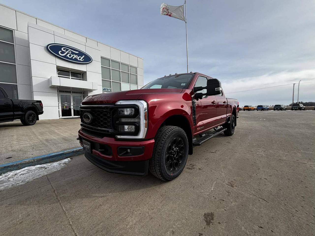 <p>Are you ready to experience the pinnacle of power and luxury? Webbs 1441 is thrilled to present a brand-new 2026 Ford F-350 Super Duty SRW LARIAT 4WD CREW CAB. This pickup truck is more than just a vehicle; its a statement. With its commanding presence and robust capabilities, this truck is poised to conquer any challenge you throw its way. Wrapped in a stunning Ruby Red Metallic Tinted Clearcoat, this F-350 is sure to turn heads wherever you go.</p><p>Step inside, and youll be enveloped in a sanctuary of comfort and sophistication. The Black Onyx interior, featuring luxurious leather heated and ventilated luxury captains chairs, elevates every journey. From long workdays to weekend getaways, youll arrive refreshed and ready. This Super Duty doesn&rsquo;t just offer brawn; it delivers a premium experience.</p><p>Here are a few of the features that make this truck stand out:</p><ul><li><strong>Unleash the Beast:</strong> The formidable 6.7L High Output Power Stroke V8 Diesel engine ensures you have all the power you need, whether youre towing, hauling, or simply cruising.</li><li><strong>Commanding Presence:</strong> The Black Appearance Package gives this truck a bold and assertive stance, making a statement on the road.</li><li><strong>Stay Connected & Powered:</strong> The Pro Power Onboard - 2KW feature transforms your truck into a mobile power source, perfect for work or play.</li><li><strong>Panoramic Views:</strong> Enjoy the expansive Twin Panel Power Moonroof, bringing the outside in and enhancing your driving experience.</li><li><strong>Ready for Anything:</strong> With the 5th Wheel/Gooseneck Hitch Prep Package, youre always prepared for serious towing and hauling tasks.</li></ul><p><strong><em>Powered by AutoIntelligence&trade;</em></strong> Powered by AutoIntelligence&trade;</p>