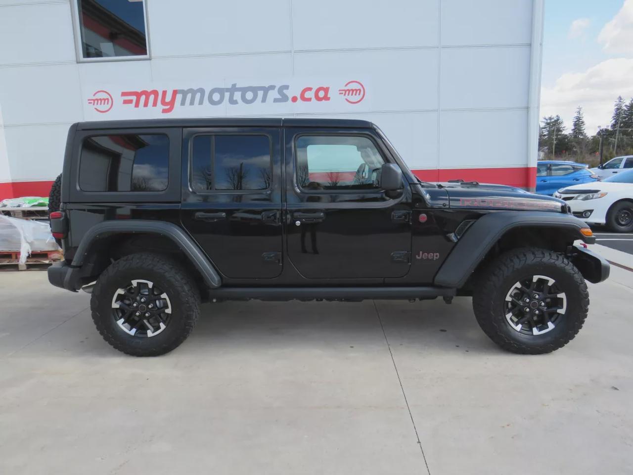 2024 Jeep Wrangler Rubicon  |  Low Km  |  One Owner  |  Clean Title | No Accidents  |  Safety Certified  |  4WD  |  Fog Lights  |  Hard Top  |  Alloy Rims  |  Navigation  | Photo