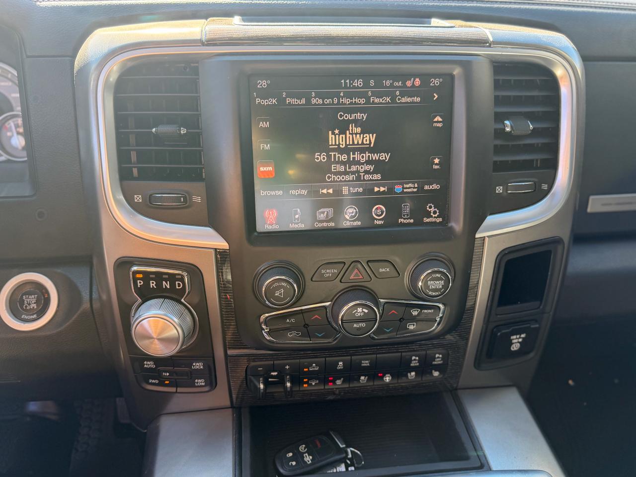 2014 RAM 1500 4WD Crew Cab 140.5  Longhorn Limited Photo