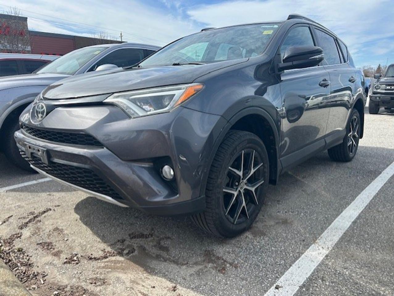 2017 Toyota RAV4 AWD SE - One Owner | Sporty, Reliable, and Ready for All Seasons

Discover the perfect balance of performance, reliability, and versatility with this 2017 Toyota RAV4 AWD SE, a one-owner SUV that has been well cared for and is ready for its next adventure. Known for its legendary durability and strong resale value, the 2017 RAV4 SE delivers a sporty driving experience with the confidence of All-Wheel Drive, making it ideal for Canadian weather and year-round driving.

Powered by a 2.5L 4-cylinder engine paired with a smooth 6-speed automatic transmission, this RAV4 provides excellent fuel efficiency while maintaining the power you need for highway merging and weekend road trips. The SE trim adds a sport-tuned suspension, stylish exterior accents, and a comfortable interior designed for both drivers and passengers.

Inside, youll find heated front seats, a power sunroof, dual-zone climate control, a touchscreen infotainment system with Bluetooth connectivity, a backup camera, and keyless entry with push-button start. The spacious cabin offers plenty of legroom along with flexible cargo space, perfect for groceries, sports gear, or family travel.

Safety is a top priority with Toyota Safety Sense, which includes advanced features like lane departure alert, adaptive cruise control, forward collision warning with automatic emergency braking, and automatic high beams.

If youre looking for a reliable used SUV with AWD, sporty styling, and excellent fuel economy, this 2017 Toyota RAV4 AWD SE is a fantastic choice. With only one previous owner, it has been maintained with care and is ready for many more kilometers of dependable driving.

Key Features:

All-Wheel Drive (AWD)

2.5L 4-Cylinder Engine

6-Speed Automatic Transmission

One Owner Vehicle

Toyota Safety Sense Package

Heated Front Seats

Power Sunroof

Backup Camera

Bluetooth Connectivity

Dual-Zone Climate Control

Sport-Tuned SE Suspension

Spacious Cargo Area

Dont miss your chance to own a dependable, sporty, and fuel-efficient compact SUV. Contact us today to schedule a test drive of this 2017 Toyota RAV4 AWD SE.