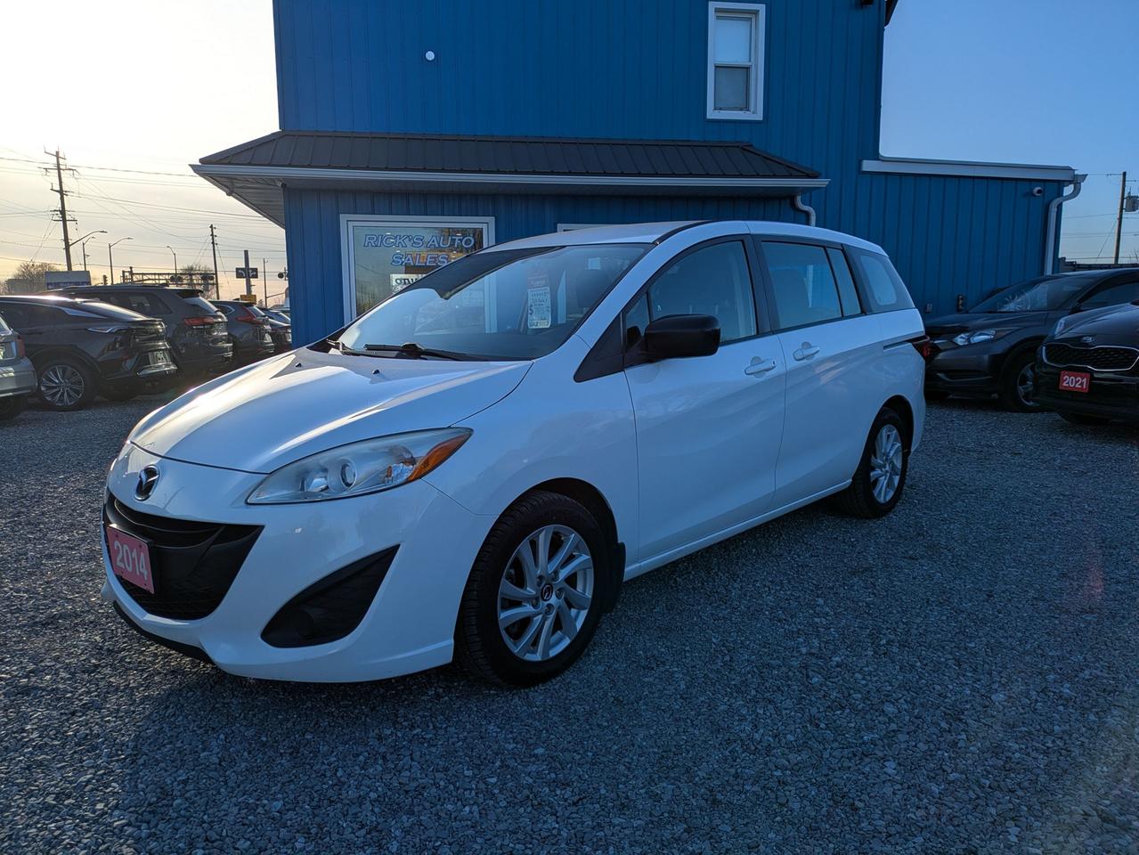 <p>Looking for a practical and versatile vehicle thats perfect for navigating the city or heading out on a weekend adventure? Check out this stylish 2014 Mazda MAZDA5 4dr Wgn Auto GS, now available at Ricks Auto Sales! This sleek minivan, finished in a classic white exterior with a sophisticated black interior, offers a comfortable and efficient driving experience. With seating for up to seven passengers, its ideal for families or anyone who needs a little extra space. This Mazda5 boasts a reliable automatic transmission and front-wheel drive, making it a breeze to handle in various driving conditions. It has 217,158km on the odometer.</p><p>This 2014 Mazda MAZDA5 at Ricks Auto Sales is packed with features designed to enhance your driving experience.</p><p>Heres a taste of what this fantastic vehicle has to offer:</p><ul><li><strong>Sliding Rear Doors:</strong> Makes loading and unloading passengers and cargo a cinch, especially in tight parking spots.</li><li><strong>Fuel-Efficient Engine:</strong> Get great mileage, saving you money at the pump.</li><li><strong>Sporty Handling:</strong> Experience the renowned Mazda driving dynamics that make every journey enjoyable.</li><li><strong>Versatile Interior:</strong> The flexible seating arrangements allow you to configure the space to fit your needs, from passengers to cargo.</li><li><strong>Automatic Transmission:</strong> Enjoy smooth and effortless gear changes, making your drive comfortable and relaxing.</li></ul><p><strong><em>Powered by AutoIntelligence&trade;</em></strong> Vehicle information has been generated using artificial intelligence and is provided for informational purposes only. While efforts are made to ensure accuracy, please confirm all details directly with the dealer.</p><p>&nbsp;</p><p class=MsoNormal>This vehicle is offered at Rick&rsquo;s Auto Sales, your Hometown Pre-Owned Sales Centre.<span style=mso-spacerun: yes;>&nbsp; </span>As an Independently Owned and operated Automotive Centre for nearly 20 years, we know our customers are the core of our business.<span style=mso-spacerun: yes;>&nbsp; </span>We pride ourselves on providing our customers with heartfelt service, and Honesty and Integrity is our motto.</p><p class=MsoNormal>** ALL PRICES ARE PLUS HST, LIC, OMVIC & $199 ADMIN FEE** We service what we sell!<span style=mso-spacerun: yes;>&nbsp; </span>The purchase price INCLUDES Certification with a 30-day/1500 km warranty covering any mechanical issues.<span style=mso-spacerun: yes;>&nbsp; </span>Vehicles come standard with ONE key (if we receive more than ONE key, we will include it).<span style=mso-spacerun: yes;>&nbsp; </span>Options to purchase additional warranty and corrosion-free rustproofing are also available.<span style=mso-spacerun: yes;>&nbsp; </span>Financing is available on qualifying vehicles.</p><p class=MsoNormal>We service the entire Niagara Region and beyond!<span style=mso-spacerun: yes;>&nbsp; </span>**CHECK OUT OUR REVIEWS AND OUR FACEBOOK PAGE**</p><p class=MsoNormal>Book an appointment or stop in for a test drive TODAY, you won&rsquo;t be disappointed!</p><p class=MsoNormal>Rick&rsquo;s Auto Sales (UCDA MEMBER) BUY WITH CONFIDENCE</p><p>&nbsp;</p>