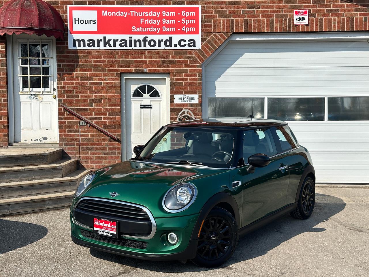 <p>WOW! Clean and comfortable MINI Cooper from Bracebridge, ON! This 2 Door Cooper model looks sharp in its Green paint and factory alloy wheels, with nice options inside and out! The exterior features keyless entry with proximity key, a large panoramic sunroof, automatic headlights, black side mirrors and roofline, a sleek rear spoiler, rear parking sensors, gorgeous Black factory Alloy wheels, a peppy and fuel-efficient 1.5L 3-Cylinder Turbocharged Engine and Automatic transmission! The interior is clean and comfortable with heated leather front seating, All-Weather Floor mats, power door locks, windows and mirrors, seating for up to 4 occupants, steering wheel Audio and Cruise controls, an easy-to-read and use gauge cluster, push button start, a central AM/FM/XM Satellite Radio with Navigation, Bluetooth, Apple CarPlay, and Backup Camera, Dual-Zone A/C climate controls with front and rear window defrost settings, USB/12V accessory ports, Auto-Stop/Start Override Switch and more!</p><p>&nbsp;</p><p>Carfax Attached, Fun and Stylish Commuter with Good KMs and Convenient Options!</p><p>&nbsp;</p><p>Call (905) 623-2906</p><p>&nbsp;</p><p>Text Ryan: (905) 429-9680 or email: ryan@markrainford.ca</p><p>&nbsp;</p><p>Text Mark: (905) 431-0966 or email: mark@markrainford.ca</p>