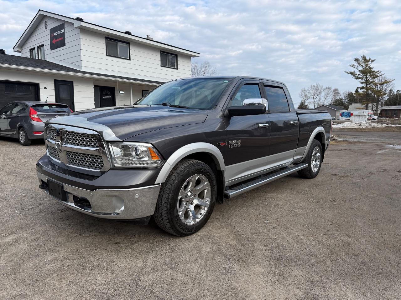 <p>Looking for a powerful and capable pickup truck thats ready for anything the Canadian landscape can throw at it? Check out this 2016 RAM 1500 4WD Crew Cab Laramie available now at 613 Rides! This rugged beauty, boasting a sleek grey exterior and a comfortable black interior, is built to handle both work and play with ease. With its robust 3L V6 Turbo Diesel engine, youll experience impressive torque and fuel efficiency, perfect for those long drives or tackling tough jobs. This truck has 176,245km on the odometer.</p><p>This RAM 1500 Laramie is more than just a workhorse; its a statement. The spacious Crew Cab offers ample room for passengers, while the 4-wheel drive system ensures confident handling in various weather conditions. Whether youre hauling equipment, embarking on a weekend adventure, or simply navigating city streets, this truck delivers a smooth, comfortable, and commanding driving experience. Visit 613 Rides today to see this impressive truck in person!</p><p>Here are 5 key features that make this RAM 1500 Laramie stand out:</p><ul><li><strong>Turbo Diesel Powerhouse:</strong> Experience the thrill of a responsive and efficient diesel engine, providing exceptional performance and impressive towing capabilities.</li><li><strong>Luxurious Laramie Trim:</strong> Enjoy a premium interior with top-of-the-line features and stylish accents, making every journey a comfortable one.</li><li><strong>Four-Wheel Drive Confidence:</strong> Conquer any terrain with the robust 4WD system, providing superior traction and control in challenging conditions.</li><li><strong>Spacious Crew Cab Comfort:</strong> Bring the whole crew along with the roomy Crew Cab, offering ample space for passengers and cargo.</li><li><strong>Iconic RAM Design:</strong> Turn heads wherever you go with the bold and unmistakable styling of the RAM 1500, a true symbol of power and capability.</li></ul><p><strong><em>Powered by AutoIntelligence&trade;</em></strong> Vehicle information has been generated using artificial intelligence and is provided for informational purposes only. While efforts are made to ensure accuracy, please confirm all details directly with the dealer.</p>