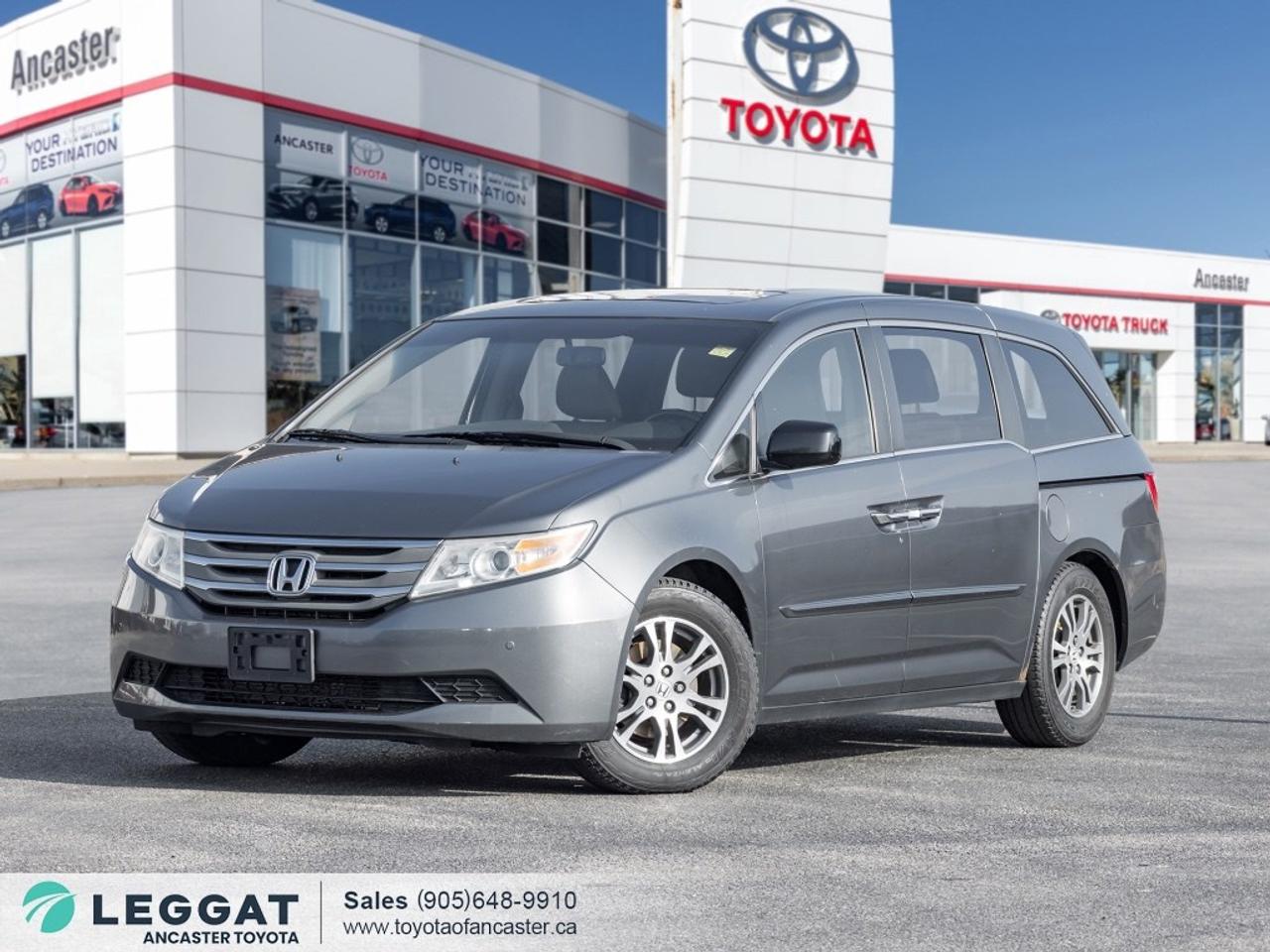 Experience the perfect blend of comfort, versatility, and family-friendly performance with the 2013 Honda Odyssey Passenger Van EX-L w/ RES (A5). This refined minivan is designed to deliver a smooth, confident ride while keeping every passenger comfortable and connected. Finished in a Grey exterior that complements the White leather interior, standing proudly on a set of 17-inch alloy wheels. Beneath the hood, you will reveal a 3.5L V6 engine paired with a 5-speed automatic transmission, providing smooth power and dependable performance for daily driving and long road trips alike. Slide into the interior and be impressed to find features including heated front seats, power sunroof, power driver and passenger seats, tri-zone automatic climate control, power sliding rear doors, rear entertainment system (RES) with overhead screen, rearview camera, steering wheel-mounted controls, AM/FM/CD audio system with Bluetooth connectivity, multiple USB ports, and so much more. Safety features include anti-lock braking system (ABS), traction control, vehicle stability assist, front and side curtain airbags, tire pressure monitoring system, and Hondas renowned safety engineering to help keep you and your passengers protected. Make your way over and experience this 2013 Honda Odyssey Passenger Van EX-L w/ RES (A5)! SCHEDULE A TEST DRIVE TODAY! With our No-Haggle, No-Hassle purchase experience, you get peace of mind knowing our best price is upfront. 1 - Guaranteed Minimum 50% Remaining Tire Tread Life 2 - Guaranteed Minimum 50% Life Remaining on Brakes 3 - 120 Point Safety Inspection 4 - Free Carfax Canada Vehicle History Report 5 - Complete Lube, Oil, & Filter Change 6 - Full Detailed Clean Up Ancaster Toyota is the proud recipient of the latest, highest honour for Canadian Toyota Retailers  the Toyota Presidents Award for Excellence in Customer Satisfaction, Sales, and Service! We are proudly serving Ancaster, Hamilton, Burlington, Dundas, Brantford, Stoney Creek, Grimsby, Oakville, Mississauga, Milton, Cambridge, Kitchener-Waterloo, Cayuga, Caledonia, St. Catharines, Welland, Niagara, and the entire GHA and GTA. Finance Price Shown. The cash purchase price slightly exceeds the advertised finance price, as we receive incentives from banks when we finance vehicles, which we pass on to customers. Recognizing the high demand for vehicles, which can raise prices, we utilize these incentives to lower the finance purchase price. Dealer reserves the right to decline cash purchases (cash, bank draft, certified cheque, credit card payments in excess of $1,000) at its sole and exclusive discretion. For Finance and Lease purchases, Dealer charges a $999 finance/lease fee. While every reasonable effort is made to ensure the accuracy of all information on this site, we are not responsible for any errors or omissions. Please verify any information in question with a dealership sales manager prior to purchase. See dealer for full details.