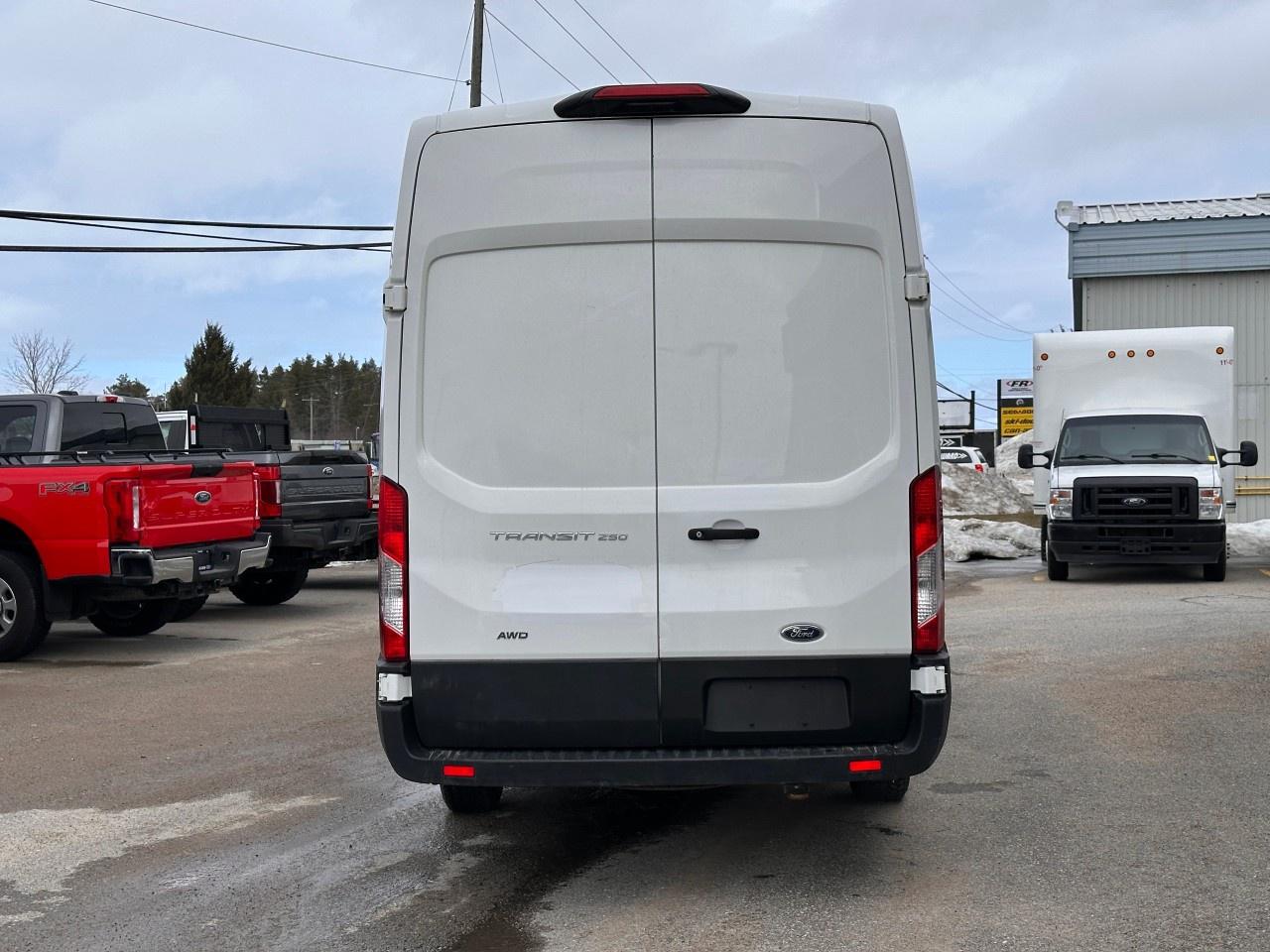 2023 Ford Transit Cargo Van T-250 148" EL HI RF 9070 GVWR AWD Photo