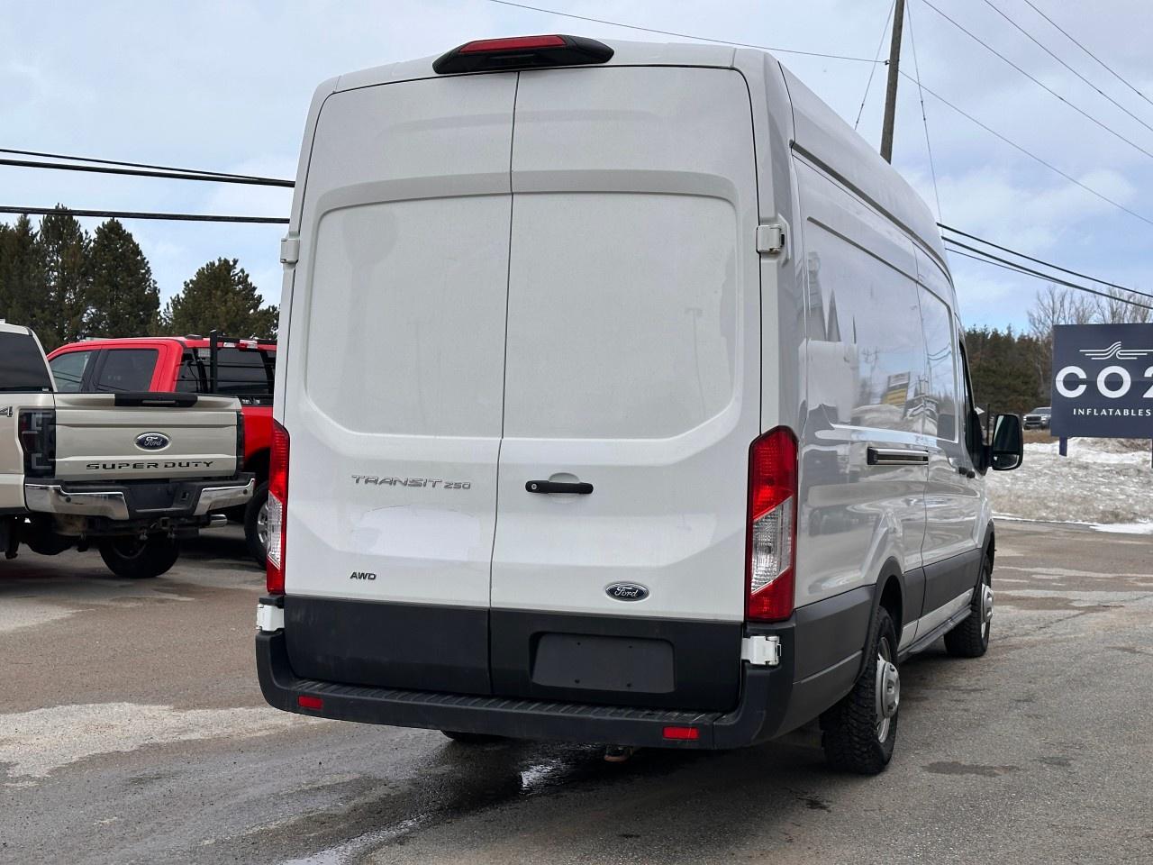 2023 Ford Transit Cargo Van T-250 148" EL HI RF 9070 GVWR AWD Photo