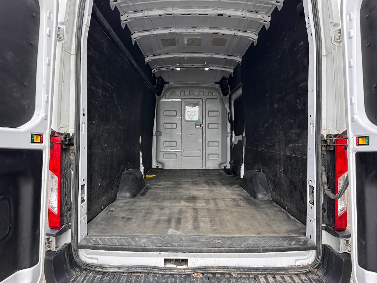 2023 Ford Transit Cargo Van T-250 148" EL HI RF 9070 GVWR AWD Photo