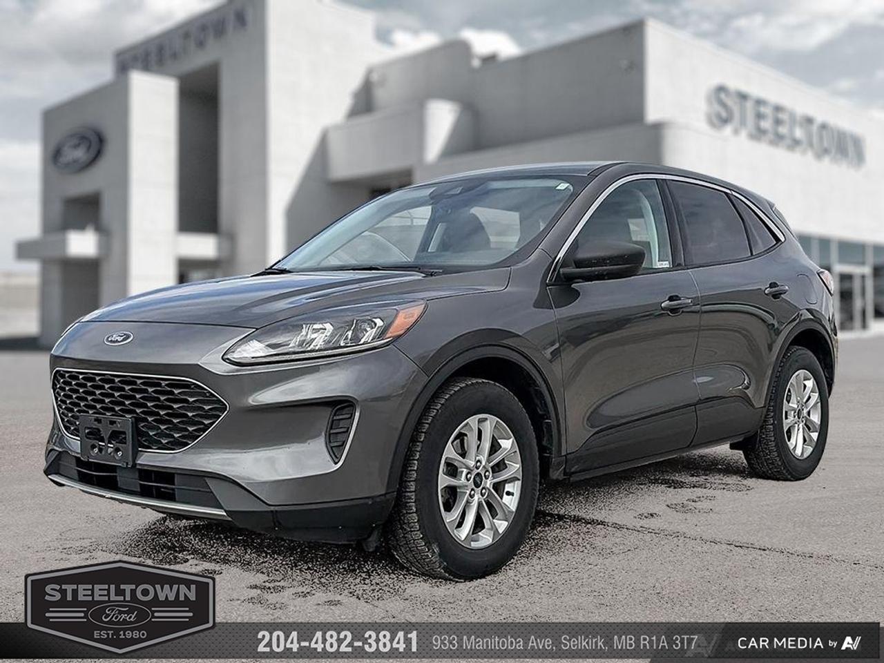 <b>Heated Seats,  Aluminum Wheels,  Android Auto,  Apple CarPlay,  Remote Start!</b><br> <br> We value your TIME, we wont waste it or your gas is on us!   We offer extended test drives and if you cant make it out to us we will come straight to you!<br><br><br> <br>Its more than just good looks that make the Escape stand out in the crowd. This 2022 Ford Escape is for sale today in Selkirk. <br> <br>The Ford Escape was built for an active lifestyle and offers plenty of options for you to hit the road in your own individual style. Whether you need a family SUV for soccer practice, a capable adventure vehicle, or both, the versatile Ford Escape has you covered. Built for those who live on the go, the Ford Escape was made to be unstoppable. This SUV has 63,112 km. Its Grey in colour. It has an Automatic transmission and is powered by a 181HP 1.5L 3 Cylinder Engine. It may have some remaining factory warranty, please check with dealer for details. <br> <br> Our Escapes trim level is SE AWD. Upgrading to this Ford Escape SE is a great choice as it comes loaded with heated front seats, stylish aluminum wheels and Fords SYNC 3 infotainment system complete with a large touchscreen, Apple CarPlay and Android Auto. Additional features include SiriusXM radio, FordPass Connect 4G LTE, a smart device remote starter and unique exterior accents. For added convenience and safety this Escape also comes with a 60-40 split-folding rear seat, remote keyless entry with a proximity key plus Ford Co-Pilot360 that features lane keep assist, a rear view camera, blind spot detection, automatic emergency braking and cross traffic alert. This vehicle has been upgraded with the following features: Heated Seats, Aluminum Wheels, Android Auto, Apple CarPlay, Remote Start, Ford Co-Pilot360, Lane Keep Assist.<br> To view the original window sticker for this vehicle view this <a href=http://www.windowsticker.forddirect.com/windowsticker.pdf?vin=1FMCU9G62NUB80710 target=_blank>http://www.windowsticker.forddirect.com/windowsticker.pdf?vin=1FMCU9G62NUB80710</a>. <br/><br> <br>To apply right now for financing use this link: <a href=http://www.steeltownford.com/?https://CreditOnline.dealertrack.ca/Web/Default.aspx?Token=bf62ebad-31a4-49e3-93be-9b163c26b54c&La target=_blank>http://www.steeltownford.com/?https://CreditOnline.dealertrack.ca/Web/Default.aspx?Token=bf62ebad-31a4-49e3-93be-9b163c26b54c&La</a><br><br> <br/><br> Buy this vehicle now for the lowest bi-weekly payment of <b>$163.98</b> with $0 down for 96 months @ 8.99% APR O.A.C. ( Plus applicable taxes -  Platinum Shield Protection & Tire Warranty included   / Total cost of borrowing $9815   ).  See dealer for details. <br> <br>Family owned and operated in Selkirk for 35 Years.  <br>Steeltown Ford is located just 20 minutes North of the Perimeter Hwy, with an onsite banking center that offers free consultations. <br>Ask about our special dealer rates available through all major banks and credit unions.<br><br><br>Steeltown Ford Protect Plus includes:<br>- Life Time Tire Warranty <br>Cars cost less in Selkirk <br><br>Dealer Permit # 1039<br><br><br> Come by and check out our fleet of 110+ used cars and trucks and 180+ new cars and trucks for sale in Selkirk.  o~o
