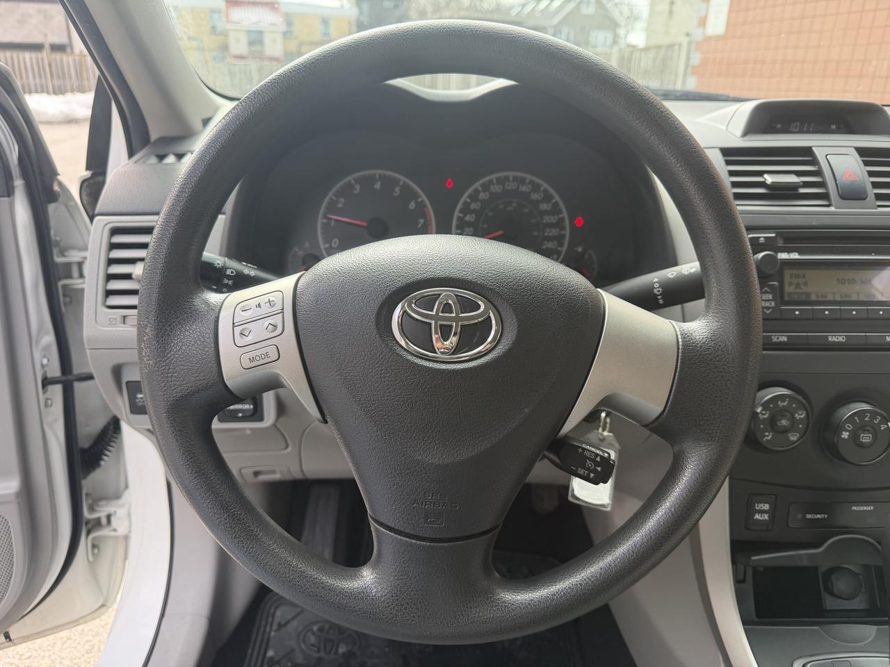 2012 Toyota Corolla 4dr Auto CE/ YES ONLY 67180 KMS !! COMES CERTIFIED Photo