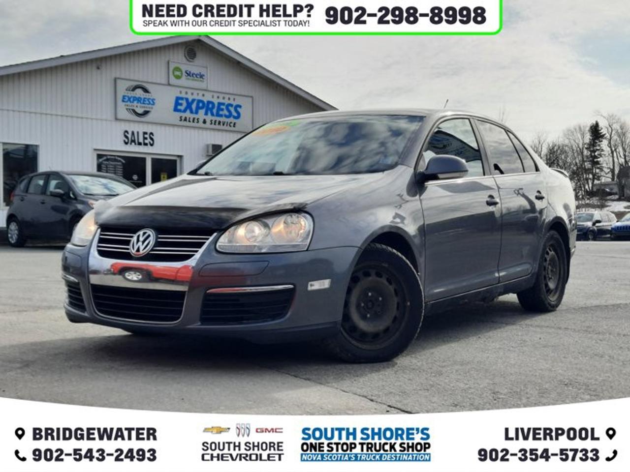 Awards: * Canadian Car of the Year AJACs Best New Family Car (under $30,000) Recent Arrival! Gray 2010 Volkswagen Jetta 2.5L Trendline FWD 6-Speed Automatic with Tiptronic 2.5L I5 SMPI DOHC 2.5L I5 SMPI DOHC, Black Cloth, 8 Speakers, ABS brakes, Air Conditioning, CD player, Front anti-roll bar, Heated door mirrors, Illuminated entry, Outside temperature display, Overhead airbag, Overhead console, Passenger vanity mirror, Power door mirrors, Power steering, Rear window defroster, Remote keyless entry, Security system, Speed control, Speed-sensing steering, Split folding rear seat, Telescoping steering wheel, Tilt steering wheel, Traction control, Turn signal indicator mirrors, Variably intermittent wipers.