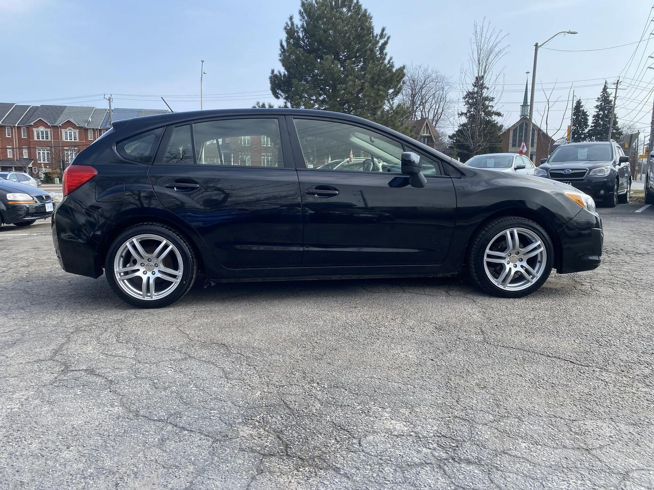 2013 Subaru Impreza Touring/AWD/Gas Saver/Automatic/Bluetooth Photo
