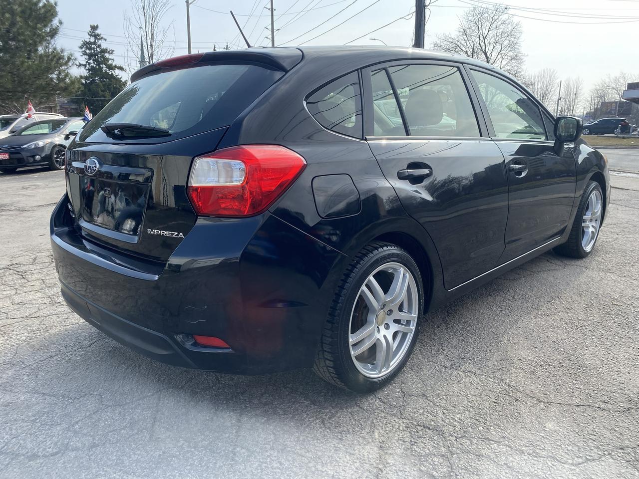 2013 Subaru Impreza Touring/AWD/Gas Saver/Automatic/Bluetooth Photo