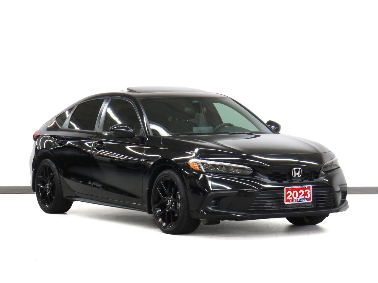 <div style=margin-bottom: 15px;><p data-path-to-node=4>Cash Price: $27,950 Finance Price: $25,950</p></div><div style=margin-bottom: 15px;><p data-path-to-node=5>Clean CarFax. 9-inch HD touchscreen | Wireless Apple CarPlay / Android Auto | 12-speaker Bose premium sound system | 10.2-inch fully digital instrument cluster | Embedded Navigation | Leather-trimmed seating surfaces | Power moonroof | Wireless phone charging | Heated front & rear seats | Heated leather-wrapped steering wheel | 18-inch machined-tinted alloy wheels | LED headlights with auto-on/off | Front & rear parking sensors | Low-speed braking control | Blind spot monitoring | Rear cross traffic monitor | Adaptive cruise control | Lane keeping assist | Backup camera | Bluetooth. 1.5L Turbocharged 4-cylinder engine (180HP). Smooth Eco Comfort. Extended warranty options available. Trades are welcome. Financing for all credit types. Same-day approval. 125-point inspection completed. Detailed from corner to corner. Over 250 high-quality used vehicles available at the lowest prices for you to choose from. All vehicles are indoors. Visit us rain or shine.</p></div><div style=margin-bottom: 15px;>Call us to book a test drive: <a href=tel:4167397262>416-739-7262</a><br>Get pre-approved for your car loan in a minute: <a href=https://www.autorama.ca/financing/>Apply for Used Car Financing</a><br>Visit our showroom: 1205 Finch Ave West, North York, ON M3J 2E8</div><div style=margin-top: 15px; margin-bottom: 15px;>&mdash;&mdash;&mdash;&mdash;&mdash;&mdash;&mdash;&mdash;&mdash;&mdash;&mdash;&mdash;&mdash;&mdash;&mdash;&mdash;&mdash;&mdash;&mdash;&mdash;&mdash;&mdash;&mdash;&mdash;&mdash;&mdash;&mdash;&mdash;</div><h3 style=margin-bottom: 5px; margin-top: 0;>Pricing&nbsp;</h3><div style=margin-bottom: 15px;>Best Priced Dealer Award Winner for consecutive years. No admin or hidden fees. Prices exclude HST and licensing. Although every effort is made to ensure accuracy, Autorama is not responsible for typographical errors, omissions, or changes. Please verify all details in person. <span style=text-decoration: underline;>All vehicles can be Certified for an additional $999</span>. If not Certified, as per OMVIC Regulations, the vehicle is deemed to be not drivable and not Certified. Special pricing is not available to commercial, dealer, or exporting purchasers.</div><div style=margin-top: 15px; margin-bottom: 15px;>&mdash;&mdash;&mdash;&mdash;&mdash;&mdash;&mdash;&mdash;&mdash;&mdash;&mdash;&mdash;&mdash;&mdash;&mdash;&mdash;&mdash;&mdash;&mdash;&mdash;&mdash;&mdash;&mdash;&mdash;&mdash;&mdash;&mdash;&mdash;</div><h3 style=margin-bottom: 5px; margin-top: 0;>Financing</h3><div style=margin-bottom: 15px;>We welcome all credit types (no credit, new to the country, bankruptcy, consumer proposal, collections, and others). We offer $0 down and no payment for up to 6 months on approved credits. Want to get started now? Apply for a <a href=https://www.autorama.ca/financing/?utm_source=vdpdesc&utm_medium=vdpdesc>car loan online</a>. Same-day auto finance approvals and same-day delivery are available for qualified customers.</div><div style=margin-top: 15px; margin-bottom: 15px;>&mdash;&mdash;&mdash;&mdash;&mdash;&mdash;&mdash;&mdash;&mdash;&mdash;&mdash;&mdash;&mdash;&mdash;&mdash;&mdash;&mdash;&mdash;&mdash;&mdash;&mdash;&mdash;&mdash;&mdash;&mdash;&mdash;&mdash;</div><h3 style=margin-bottom: 5px; margin-top: 0;>Vehicle Review</h3><div style=margin-bottom: 15px;><p data-path-to-node=15>The 2023 Honda Civic Hatchback Sport Touring is the pinnacle of the 11th-generation Civic lineup, combining the versatility of a liftback with the premium amenities of a luxury sedan. This top-tier trim features the potent 180HP 1.5L Turbocharged engine, delivering a punchy and fuel-efficient drive thats perfectly suited for both city commutes and highway touring. Inside, the cabin is a tech powerhouse, debuting the immersive 12-speaker Bose premium audio system and a massive 9-inch touchscreen with wireless connectivity. With its mature styling, generous cargo space, and a full suite of Honda Sensing safety technologies, the Sport Touring offers a grown-up driving experience that feels incredibly refined. It remains the absolute gold standard for anyone seeking a practical, high-tech, and reliable hatchback in the GTA. We have a wide selection of used <a href=https://www.autorama.ca/used/honda-civic/ target=_blank rel=noopener>Honda Civic</a> to help you choose.</p></div><div style=margin-top: 15px; margin-bottom: 15px;>&mdash;&mdash;&mdash;&mdash;&mdash;&mdash;&mdash;&mdash;&mdash;&mdash;&mdash;&mdash;&mdash;&mdash;&mdash;&mdash;&mdash;&mdash;&mdash;&mdash;&mdash;&mdash;&mdash;&mdash;&mdash;&mdash;&mdash;&mdash;</div><h3 style=margin-bottom: 5px; margin-top: 0;>Warranty</h3><div style=margin-bottom: 15px;>This vehicle qualifies for an extended warranty with a variety of terms and coverage options. Ask us anytime, we&rsquo;ll help you choose the plan that&rsquo;s right for you.</div><div style=margin-top: 15px; margin-bottom: 15px;>&mdash;&mdash;&mdash;&mdash;&mdash;&mdash;&mdash;&mdash;&mdash;&mdash;&mdash;&mdash;&mdash;&mdash;&mdash;&mdash;&mdash;&mdash;&mdash;&mdash;&mdash;&mdash;&mdash;&mdash;&mdash;&mdash;&mdash;&mdash;</div><h3 style=margin-bottom: 5px; margin-top: 0;>Trade-In / Appraisal</h3><div style=margin-bottom: 15px;>Have a vehicle to trade? We pay top dollar for trades, any vehicle, any condition. Bring your trade for a free appraisal when you visit us or you can apply for</div><div style=margin-top: 15px; margin-bottom: 15px;>&mdash;&mdash;&mdash;&mdash;&mdash; &mdash;&mdash;&mdash;&mdash;&mdash;&mdash;&mdash;&mdash;&mdash;&mdash;&mdash;&mdash;&mdash;&mdash;&mdash;&mdash;&mdash;&mdash;&mdash;&mdash;&mdash;&mdash;&mdash;</div><h3 style=margin-bottom: 5px; margin-top: 0;>Visit / Showroom Info</h3><div style=margin-bottom: 15px;>Visit our indoor showroom (rain or shine) at:<br>Autorama 1205 Finch Ave West, North York, ON M3J 2E8<br>Call us at <a href=tel:4167397262>416-739-7262</a> to book a test drive or ask questions.</div><div style=margin-top: 15px; margin-bottom: 15px;>&mdash;&mdash;&mdash;&mdash;&mdash;&mdash;&mdash;&mdash;&mdash;&mdash;&mdash;&mdash;&mdash;&mdash;&mdash;&mdash;&mdash;&mdash;&mdash;&mdash;&mdash;&mdash;&mdash;&mdash;&mdash;&mdash;&mdash;&mdash;</div><h3 style=margin-bottom: 5px; margin-top: 0;>Who we are</h3><div style=margin-bottom: 15px;>Autorama is Toronto&rsquo;s trusted, award-winning <a href=https://www.autorama.ca/?utm_source=vdpdesc&utm_medium=vdpdesc>used car dealership</a>, offering over 250 hand-picked vehicles at the lowest prices. We&rsquo;re committed to exceptional service and have proudly served Toronto, Mississauga, Brampton, and the GTA for over 25 years &mdash; and with our full indoor showroom, you can visit us rain or shine.</div><div style=margin-top: 15px; margin-bottom: 15px;>&mdash;&mdash;&mdash;&mdash;&mdash;&mdash;&mdash;&mdash;&mdash;&mdash;&mdash;&mdash;&mdash;&mdash;&mdash;&mdash;&mdash;&mdash;&mdash;&mdash;&mdash;&mdash;&mdash;&mdash;&mdash;&mdash;&mdash;&mdash;</div><h3 style=margin-bottom: 5px; margin-top: 0;>Disclaimers</h3><ul style=margin-top: 0; padding-left: 20px;><li><span data-olk-copy-source=MessageBody>Prices exclude HST and licensing.</span></li></ul><ul style=margin-top: 0; padding-left: 20px;><li data-ogsc= data-olk-copy-source=MessageBody>Prices, rates, and payments are subject to change without notice.</li></ul><ul style=margin-top: 0; padding-left: 20px;><li data-ogsc= data-olk-copy-source=MessageBody>Advertised price includes a $2,000 finance credit. Cash price may differ.</li></ul><ul style=margin-top: 0; padding-left: 20px;><li data-ogsc= data-olk-copy-source=MessageBody>All vehicles come standard with one key. Additional keys may be purchased at the time of sale.</li></ul><ul style=margin-top: 0; padding-left: 20px;><li><span data-olk-copy-source=MessageBody>Although every effort is made to ensure accuracy, Autorama is not responsible for typographical errors, omissions, or changes. Please verify all details with your Sales & Finance Specialist.</span></li></ul>