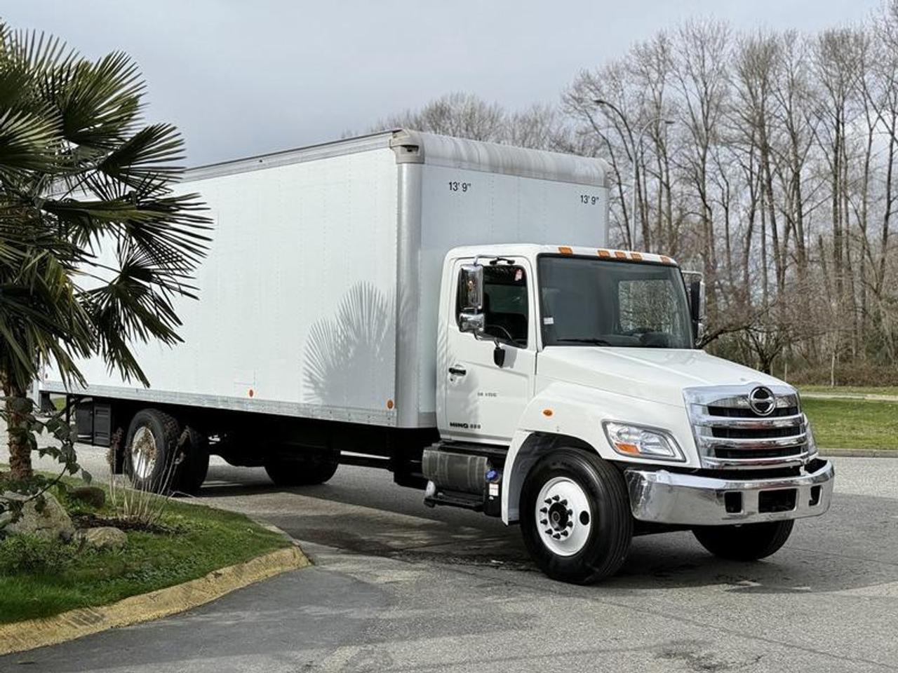 This 2017 Hino 338 cube van is powered by a 7.6L inline-6 diesel paired with an automatic transmission and rear-wheel drive, and is equipped with hydraulic brakes and a GVWR of approximately 14,950 kg. It features a 26-foot cargo box measuring approximately 26 feet long by 8.5 feet wide and 8.5 feet high, along with a Maxon power tailgate rated at 4,400 lbs for efficient loading and unloading. Additional equipment includes an exhaust brake, power/economy drive mode, air conditioning and heat, AM/FM radio with CD player, and power heated mirrors. Finished in white with a grey cloth interior, overall vehicle dimensions are approximately 37 feet long, 8 feet 9 inches wide, and 13 feet 10 inches high, making it well suited for delivery, moving, or commercial fleet use. This item is currently OFFSITE. You must register an appointment with our office to schedule an offsite viewing. Appointments must be made a minimum of one business day in advance (and as defined by the days that Repo.com is open for business) before your appointment can be scheduled and confirmed. We may, at our own discretion, instead opt to transport smaller items to Repo.coms main yard for viewing purposes.  $68,830.00 plus $375 processing fee, $69,205.00 total payment obligation before taxes.   Listing report, warranty, contract commitment cancellation fee, financing available on approved credit (some limitations and exceptions may apply). All above specifications and information is considered to be accurate but is not guaranteed and no opinion or advice is given as to whether this item should be purchased. We do not allow test drives due to theft, fraud, acts of vandalism and undetectable impaired driving. Instead we provide the following benefits: Complimentary Warranty (with options to extend), Limited Money Back Satisfaction Guarantee on Fully Completed Contracts, Contract Commitment Cancellation, and an Open-Ended Sell-Back Option. Ask seller for details or call 604-522-REPO(7376) to confirm listing availability.