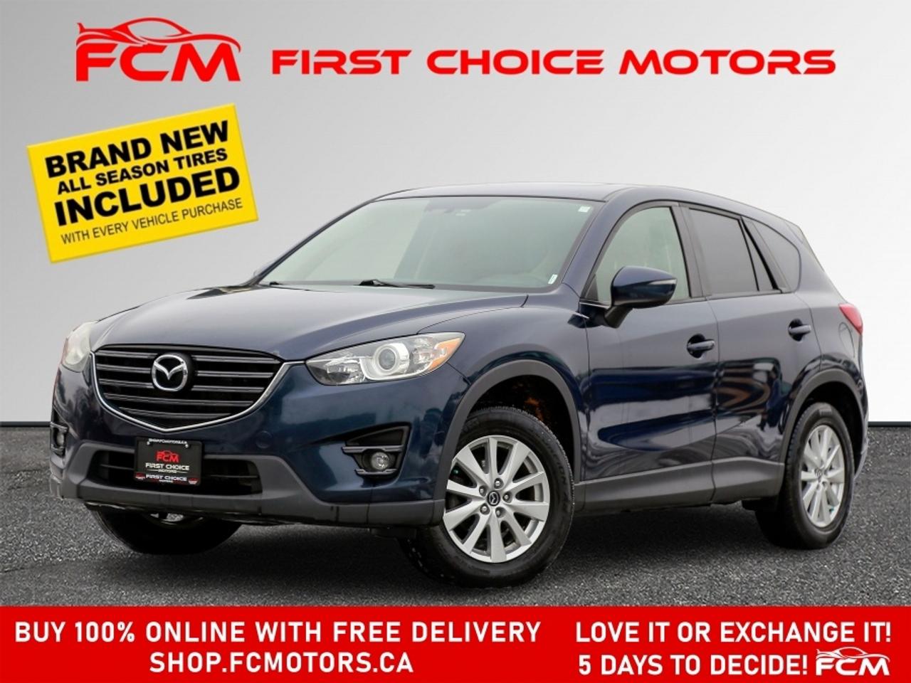** ** SPECIAL LIMITED TIME OFFER ** ** PURCHASE ANY VEHICLE THIS WEEK AND RECEIVE 4 BRAND-NEW ALL-SEASON TIRES AT NO ADDITIONAL COST!!! DONT MISS THIS EXCLUSIVE CHANCE TO UPGRADE YOUR RIDE AND STAY PREPARED FOR ANY WEATHER!!!       EXCITING NEWS FROM FIRST CHOICE MOTORS! Our brand-new online showroom is now open to the public, bringing the ultimate car shopping experience right to your fingertips! Enjoy a 100% online car shopping experience, with over 500 certified vehicles in stock, comprehensive protection plans, and thousands of new auto parts & accessories available! Plus, for a limited time, were offering FREE deliveries across Ontario on all vehicle purchases! Dont miss outvisit Shop.fcmotors.ca to find and upgrade your perfect vehicle today!      Welcome to First Choice Motors, the largest car dealership in Toronto of pre-owned cars, SUVs, and vans priced between $5000-$15,000. With an impressive inventory of over 300 vehicles in stock, we are dedicated to providing our customers with a vast selection of affordable and reliable options.       Were thrilled to offer a used 2016 Mazda CX-5 TOURING, dark blue color with 231,000km (STK#9449) This vehicle was $11990 NOW ON SALE FOR $10990. It is equipped with the following features:   - Automatic Transmission   - Sunroof   - Heated seats   - Navigation   - Bluetooth   - Reverse camera   - Alloy wheels   - Power windows   - Power locks   - Power mirrors   - Air Conditioning      At First Choice Motors, we believe in providing quality vehicles that our customers can depend on. All our vehicles come with a 36-day FULL COVERAGE warranty. We also offer additional warranty options up to 5 years for our customers who want extra peace of mind.      Furthermore, all our vehicles are sold fully certified with brand new brakes rotors and pads, a fresh oil change, and brand new set of all-season tires installed & balanced. You can be confident that this car is in excellent condition and ready to hit the road.      At First Choice Motors, we believe that everyone deserves a chance to own a reliable and affordable vehicle. Thats why we offer financing options with low interest rates starting at 7.9% O.A.C. Were proud to approve all customers, including those with bad credit, no credit, students, and even 9 socials. Our finance team is dedicated to finding the best financing option for you and making the car buying process as smooth and stress-free as possible.      Our dealership is open 7 days a week to provide you with the best customer service possible. We carry the largest selection of used vehicles for sale under $9990 in all of Ontario. We stock over 300 cars, mostly Hyundai, Chevrolet, Mazda, Honda, Volkswagen, Toyota, Ford, Dodge, Kia, Mitsubishi, Acura, Lexus, and more. With our ongoing sale, you can find your dream car at a price you can afford. Come visit us today and experience why we are the best choice for your next used car purchase!      All prices include $22.00 OMVIC Fee.  Excludes, license plates, ownership registration and ONTARIO HST (13%)   *No Credit Card payments can be accepted for Vehicle Purchases*    *No Credit Card payments can be accepted for Vehicle Purchases*