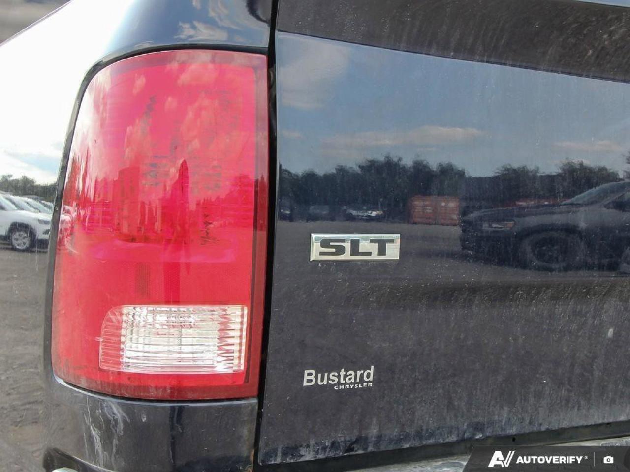 2016 RAM 1500 4WD Crew Cab 140.5  SLT Photo