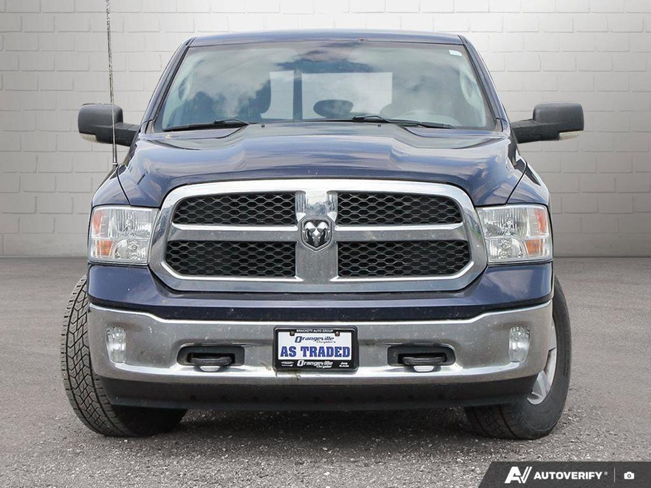 2016 RAM 1500 4WD Crew Cab 140.5  SLT Photo