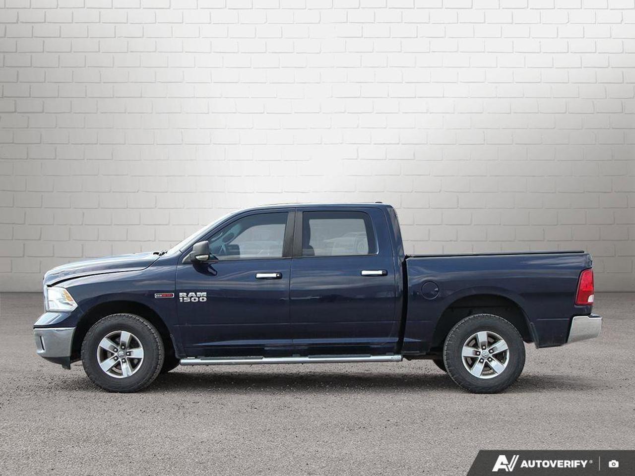 2016 RAM 1500 4WD Crew Cab 140.5  SLT Photo2