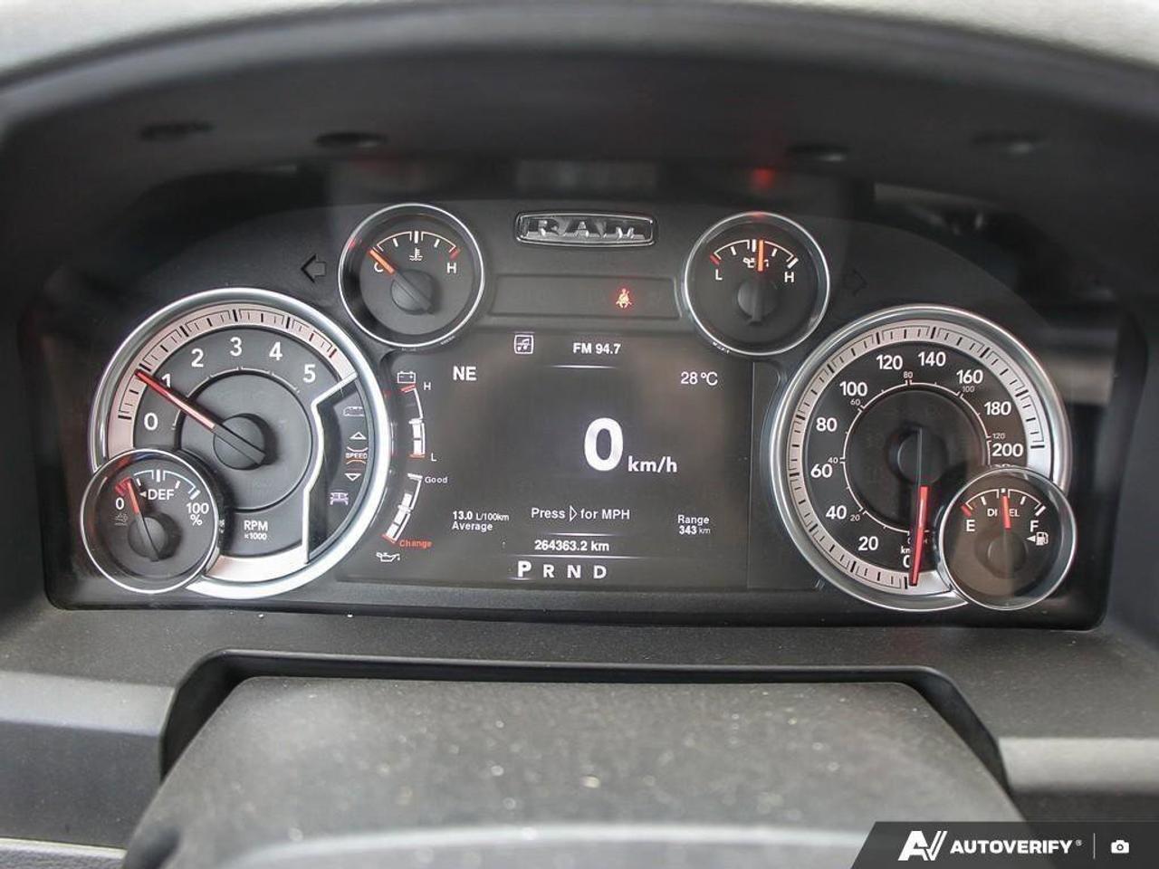 2016 RAM 1500 4WD Crew Cab 140.5  SLT Photo