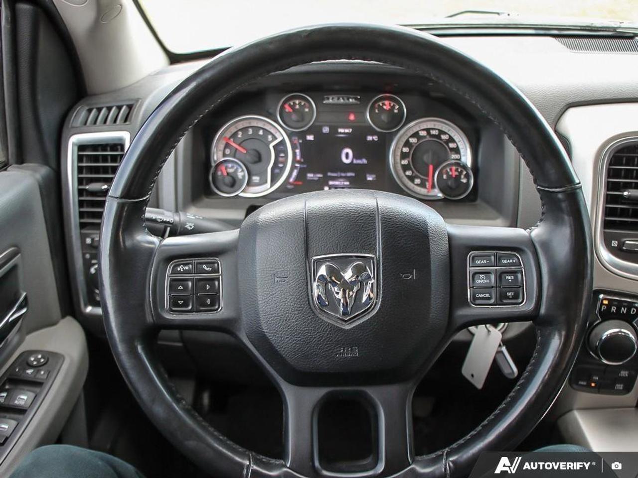 2016 RAM 1500 4WD Crew Cab 140.5  SLT Photo