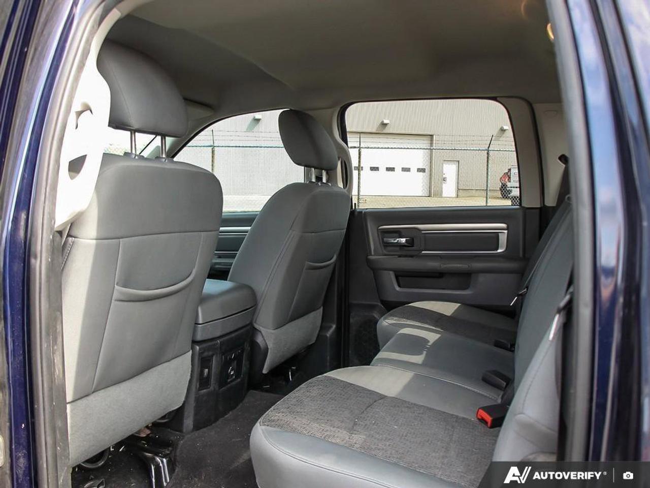 2016 RAM 1500 4WD Crew Cab 140.5  SLT Photo