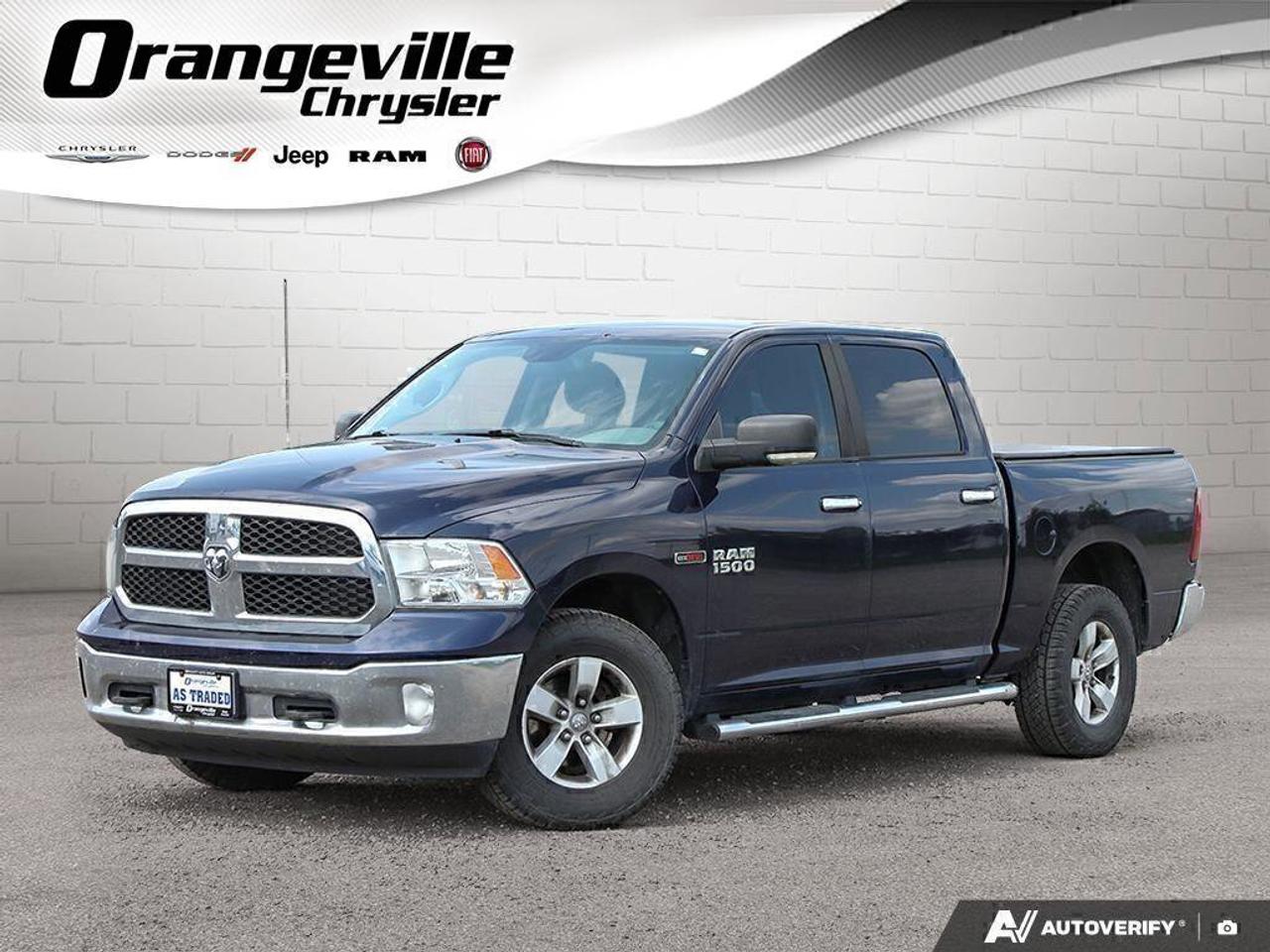 2016 RAM 1500 4WD Crew Cab 140.5  SLT Photo