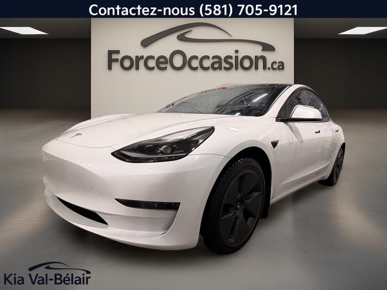Jamais Accidenté // Un seul propriétaire // Inspecté en 135 points

Le Tesla Model 3 2023 STANDARD RANGE RWD * 271HP * CUIR * TOIT * CAMÉRA 360° * présenté chez Kia Val-Bélair à Québec est une berline 100% électrique qui mise sur une conduite silencieuse, une réponse rapide et un équipement recherché. Ce véhicule usagé blanc à intérieur noir affiche 72 172 km et propose notamment le toit ouvrant en verre, les sièges chauffants et la caméra de recul.

CARACTÉRISTIQUES DU VÉHICULE ÉLECTRIQUE
»» Motorisation 100% électrique à propulsion arrière
»» Puissance annoncée de 271 chevaux
»» Recharge sur courant alternatif et rapide
»» Conduite silencieuse sans consommation dessence

CARACTÉRISTIQUES DU Model 3 STANDARD RANGE RWD * 271HP * CUIR * TOIT * CAMÉRA 360° *
»» Version à propulsion arrière, comportement équilibré
»» Toit ouvrant en verre pleine longueur
»» Habitacle noir avec sièges à réglage électrique
»» Format berline à 4 portes pratique

CARACTÉRISTIQUES DE SÉCURITÉ AVANCÉES
»» Avertissement de sortie de voie inclus
»» Surveillance des angles morts incluse
»» Caméra de recul pour manoeuvres
»» Contrôle de stabilité et freins ABS

PERFORMANCE ET EFFICACITÉ
»» Réponse immédiate typique dun moteur électrique
»» Transmission automatique à fonctionnement fluide
»» Direction assistée pour conduite quotidienne aisée
»» Pneus haute performance déjà mentionnés

CONFORT
»» Sièges avant chauffants pour lhiver
»» Sièges arrière chauffants pour passagers
»» Siège conducteur électrique avec soutien lombaire
»» Climatisation automatique à deux zones

TECHNOLOGIE ET CONNECTIVITÉ
»» Intégration Bluetooth pour appels et audio
»» Système de navigation GPS intégré
»» Commandes audio directement au volant
»» Démarrage par bouton-poussoir pratique

ESPACE DE CHARGEMENT
»» Coffre arrière avec ouverture à distance
»» Accès au coffre arrière pratique
»» Configuration berline à 4 portes utile
»» Hayon électrique mentionné dans léquipement

RÉCOMPENSES ET RECONNAISSANCES
»» Top Safety Pick+, Insurance Institute for Highway Safety, 2023

APPRÉCIÉ DES AUTRES PROPRIÉTAIRES
»» Accélération vive et livraison du couple immédiate
»» Habitacle calme en conduite quotidienne
»» Coûts dénergie réduits au quotidien
»» Simplicité dutilisation jour après jour

GARANTIE
»» Garantie légale seulement
»» Garantie dusage
»» Garantie de durée raisonnable
»» Garantie contre les vices cachés

Ce Tesla Model 3 2023 STANDARD RANGE RWD * 271HP * CUIR * TOIT * CAMÉRA 360° * se distingue par sa motorisation 100% électrique, sa présentation sobre en blanc et noir, ainsi que ses équipements utiles au quotidien. Avec ses 4 portes, ses sièges chauffants avant et arrière, ses rétroviseurs chauffants, ses phares à DEL, ses vitres électriques et ses fonctions de sécurité déjà en place, il offre une combinaison intéressante pour la conduite à Québec en toute saison.

Ce véhicule usagé propose aussi plusieurs éléments appréciés dans un usage journalier, comme le régulateur de vitesse, les rétroviseurs électriques escamotables, les sièges à mémoire, le volant réglable, le rétroviseur intérieur électrochromatique et la surveillance de la pression des pneus. Son rouage à propulsion arrière et sa puissance annoncée de 271 chevaux contribuent à une expérience de conduite directe, typique dun véhicule 100% électrique bien calibré pour la route.

Le NIV de ce Tesla Model 3 STANDARD RANGE RWD * 271HP * CUIR * TOIT * CAMÉRA 360° * 2023 est le 5YJ3E1EA5PF406972 .

Garantie prolongée disponible, livraison en 48h