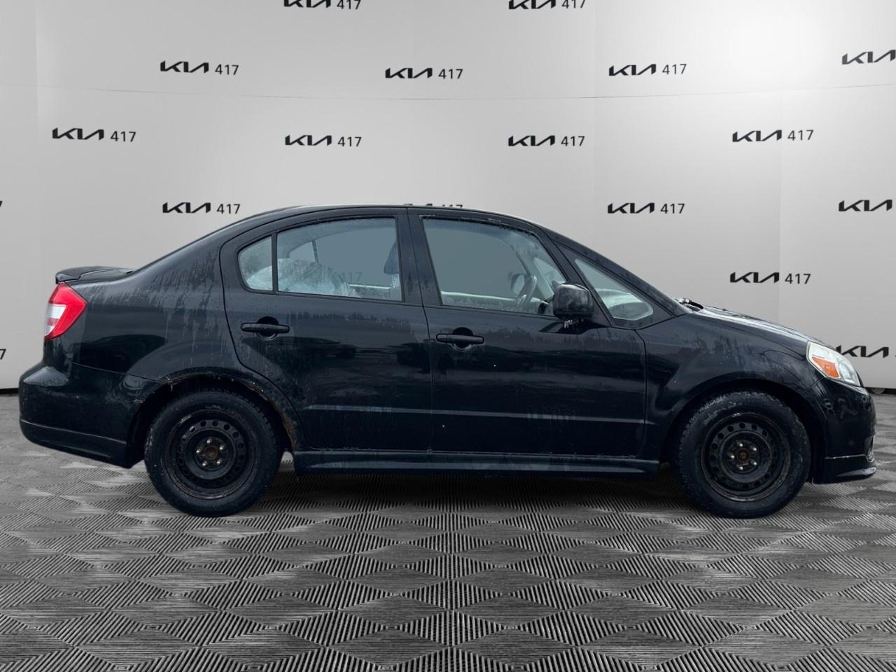 2010 Suzuki SX4 Sedan 4Dr Sport 5sp w ESP Photo