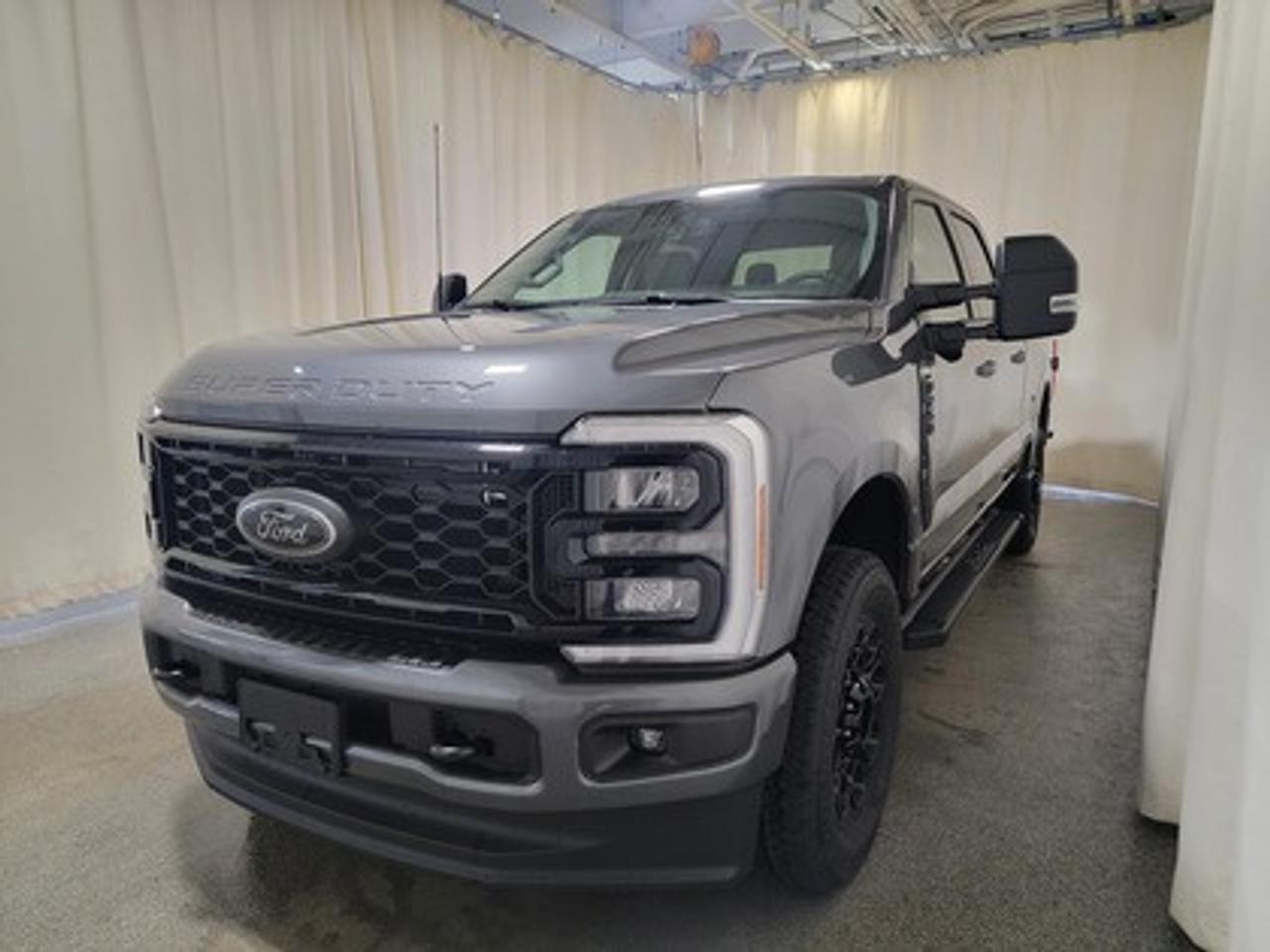 This all new 2026 Ford F-250 XLT Crew Cab 4X4 603A looks absolutely stunning in Carbonized Grey Metallic. This heavy duty picks up comes with the 7.3L Power Stroke Diesel engine. This remarkable engine not only produces 475 horsepower and 1,050 ft pounds of torque, but by leveraging technology and a 10-speed automatic transmission. This truck can tow up to a massive amount of 20,000 pounds!

Key Features:
Ford Connectivity Package 
8 LCD Touchscreen 
Apple CarPlay & Android Auto Compatibility 
Cruise Control 
Remote Keyless Entry
XLT Premium Package
Engine Block Heater
Black Appearance Package

This vehicle comes with the All-Weather Packageready to take on any season!
Snow, rain, mud, or sunshinethis vehicle is built for it all! The All-Weather Package adds extra protection where it matters most, with premium mud flaps to shield your paint from road debris, all-weather floor mats to protect your interior from lifes messes, and Xpel paint protection to help guard against those infuriating rock chips. Drive with confidence, knowing your investment is protected from Regina's elements.

Bennett Dunlop Ford, proudly serving Regina for over 40 years, is conveniently located at 770 Broad Street. With over 3,500 Google reviews, our reputation reflects our commitment to providing a fast, easy, and enjoyable vehicle-buying experience. We eliminate the hassle with no admin or documentation fees, transparent upfront pricing lets you shop with total confidence. But were more than just a dealershipwere driven to make a difference by supporting local community initiatives and events that matter to you. Visit Bennett Dunlop Ford today and experience why were Reginas trusted choice for quality vehicles, exceptional service, and a genuine commitment to driving change in our community!