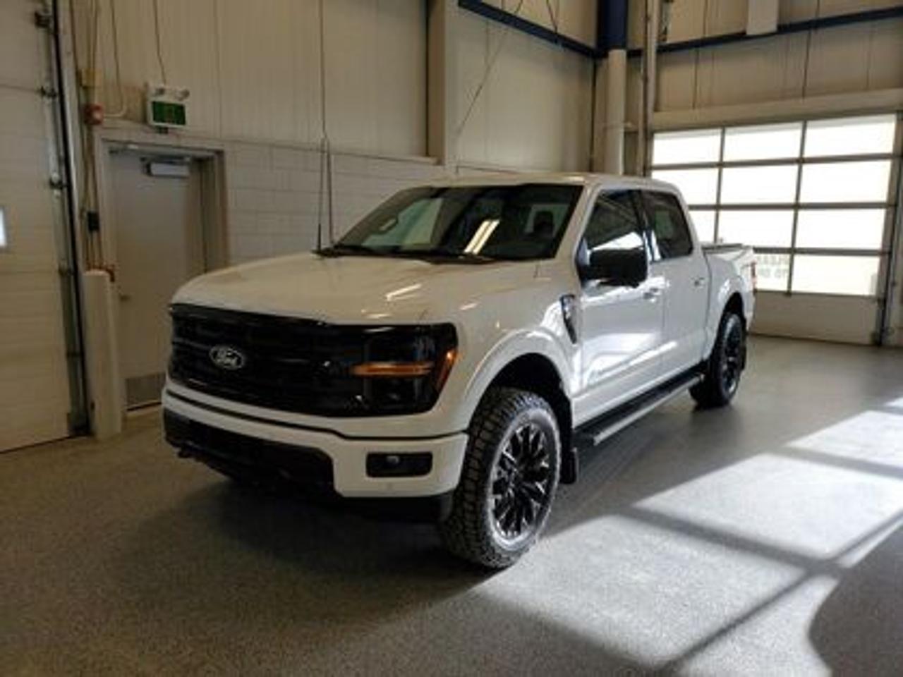 The all-new 2026 Ford F-150 XLT 302A is a statement of style in Oxford White. Powered by the 2.7L engine, it delivers 400 horsepower and 500 lb-ft of torque, paired with a 10-speed automatic transmission. This truck achieves an impressive, combined fuel economy of 11.8 L/100 km (24 miles per gallon).

Key Features:
12 LCD Captivity Touchscreen
Electronic Power-Assist Steering
Dual-Zone Electronic Auto Temp Control
Cruise Control
Power Windows
AdvanceTrac® With Roll Stability Control
Perimeter Alarm
Ford Co-Pilot360
Lane Keeping System
Rear View Camera
Rear Parking Sensors
Reverse Park Assist
Class IV Trailer Hitch
Power Drivers Seat
Remote Start
SYNC®4
Apple Car Play
18 All Terrain Tires
Bluetooth Connectivity
XLT Black Appearance Package
Engine Block Heater
Bed Utility Package

Moose Jaw Ford, conveniently located at 1010 North Service Road in Moose Jaw, is your trusted destination for all your automotive needs. With an impressive 4.8-star Google rating from nearly 1,500 reviews, we are proud to deliver an exceptional vehicle-buying experience tailored just for you. Our Moose Jaw Motives set us apart, offering unbeatable value like half-priced oil changes for life on pre-owned vehicles, one year of key and remote protection, and one year of tire and rim protection. Enjoy peace of mind with every purchase. At Moose Jaw Ford, were committed to driving positive change in our community by combining exceptional service, high-quality vehicles, and a guest-first approach. Visit us today!