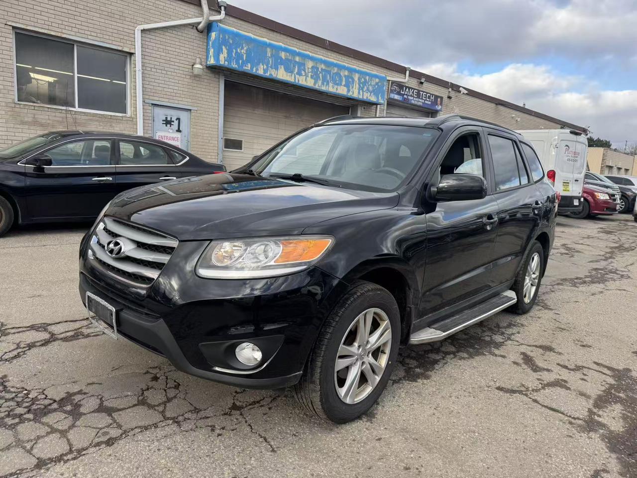 2012 Hyundai Santa Fe AWD 4DR I4 AUTO GL PREMIUM Photo0