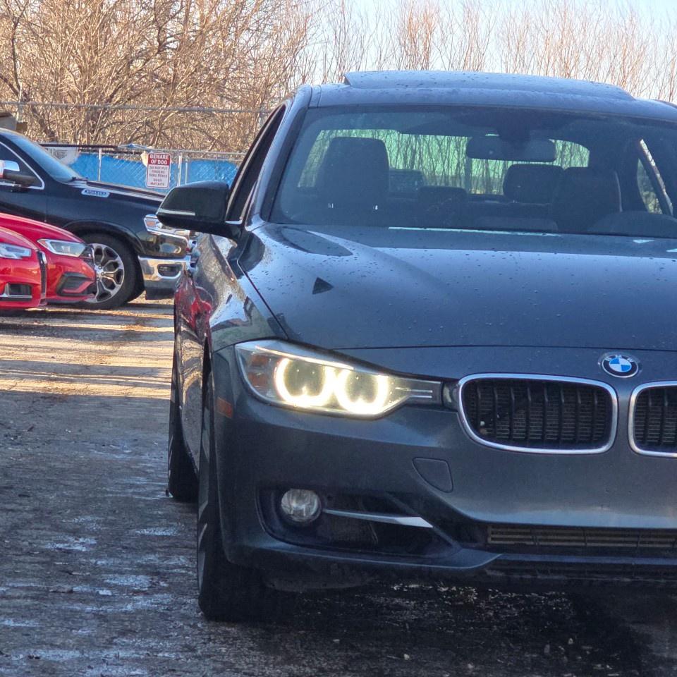 2013 BMW 3 Series 4dr Sdn 328i xDrive Classic Line AWD *Ltd Avail* Photo