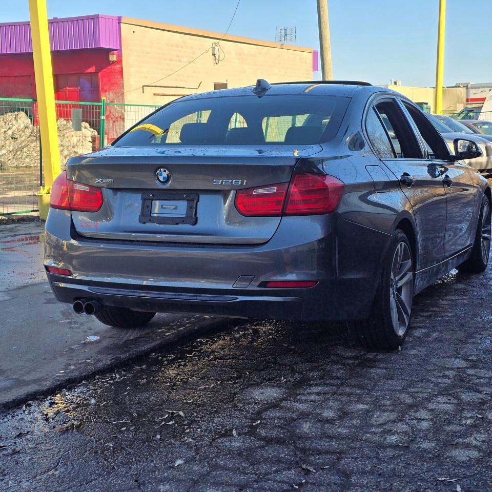2013 BMW 3 Series 4dr Sdn 328i xDrive Classic Line AWD *Ltd Avail* Photo