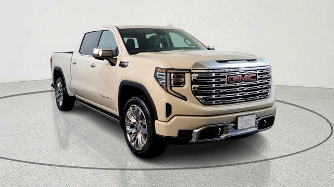 The 2026 GMC Sierra 1500 Denali with the 6.2-L V8 delivers impressive performance, producing 420 horsepower and 460 lb-ft of torque, paired with a 10-speed automatic transmission and featuring Dynamic Fuel Management for efficiency and strength. With the Denali Reserve Package, a sunroof, MultiPro power steps, a technology package including a rear-camera mirror and 15-inch multicolor head-up display are included. Visually and in ride presence, the 22-inch painted aluminum wheels with machining and bright chrome inserts set this trim apart, and the Jet Black Forge perforated leather interior with heated/ventilated front seats, as well as many comfort and driver assistance features rounds out the premium experience.
